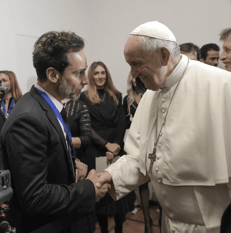 Antonio Del Prete meeting the Pope after screening Seeking Rebirth by Luca Pizzoleo