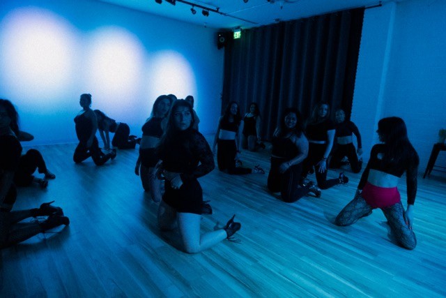 Dancers in heels on the floor at bookabl studio oceanside