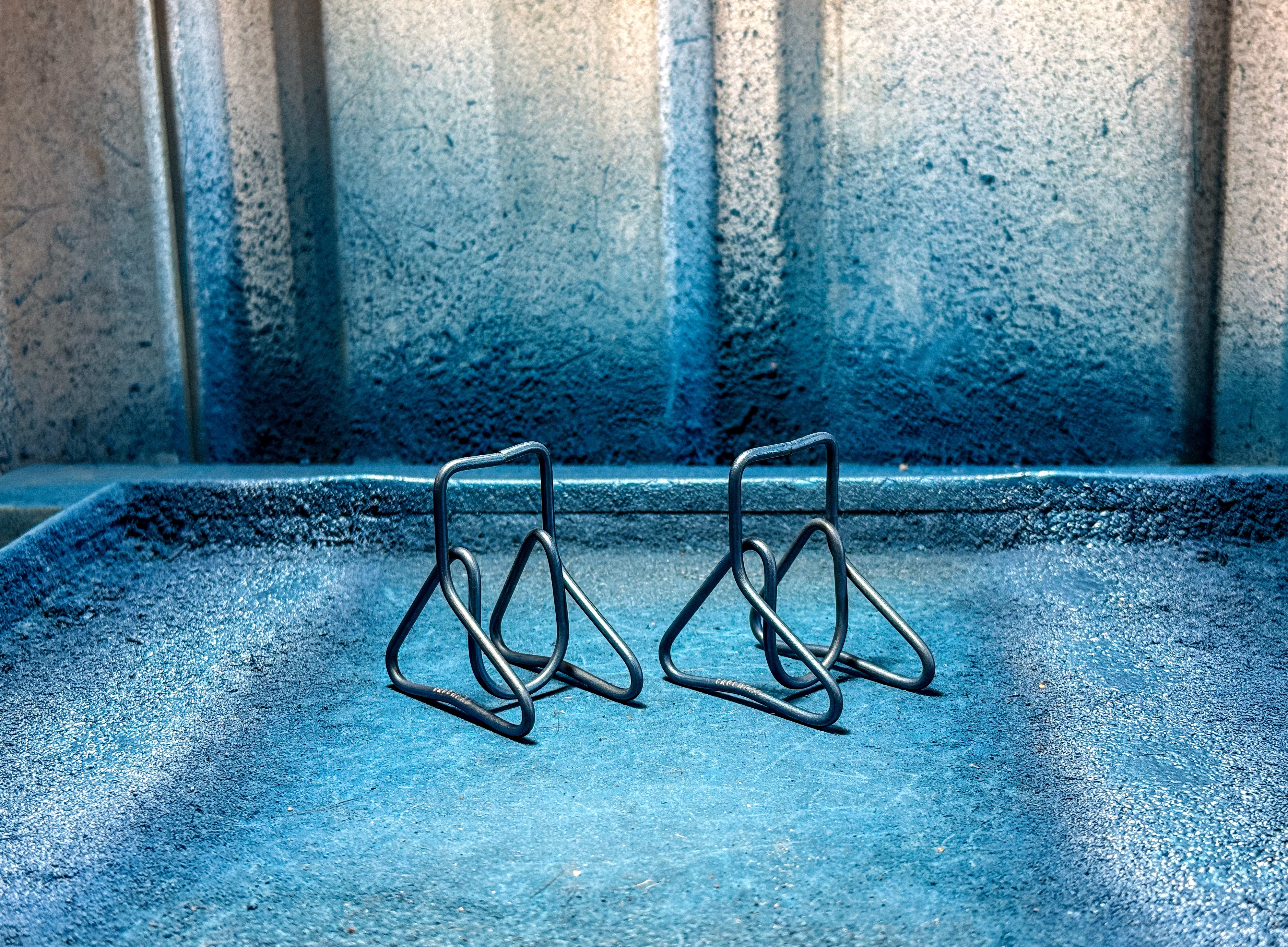 the sun is setting over a deck with a book on it
