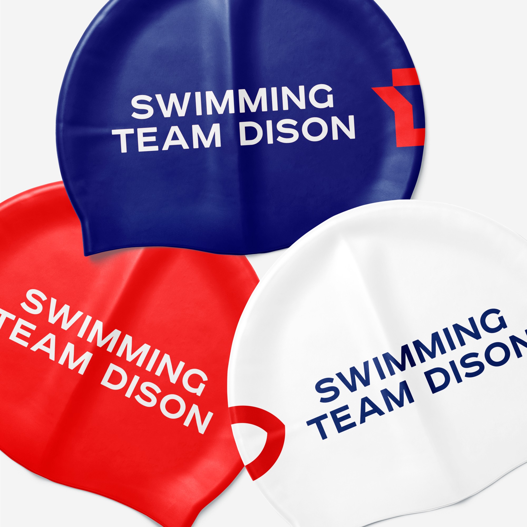 Modern home office setup with a monitor, ergonomic chair, keyboard, and indoor plants near a window with blinds.