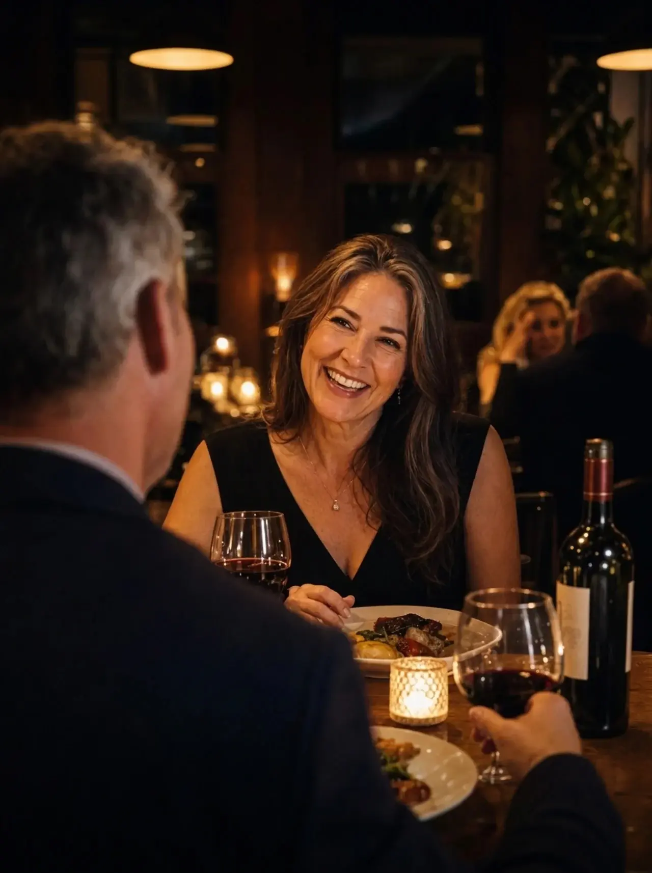 Man and woman talking across a table