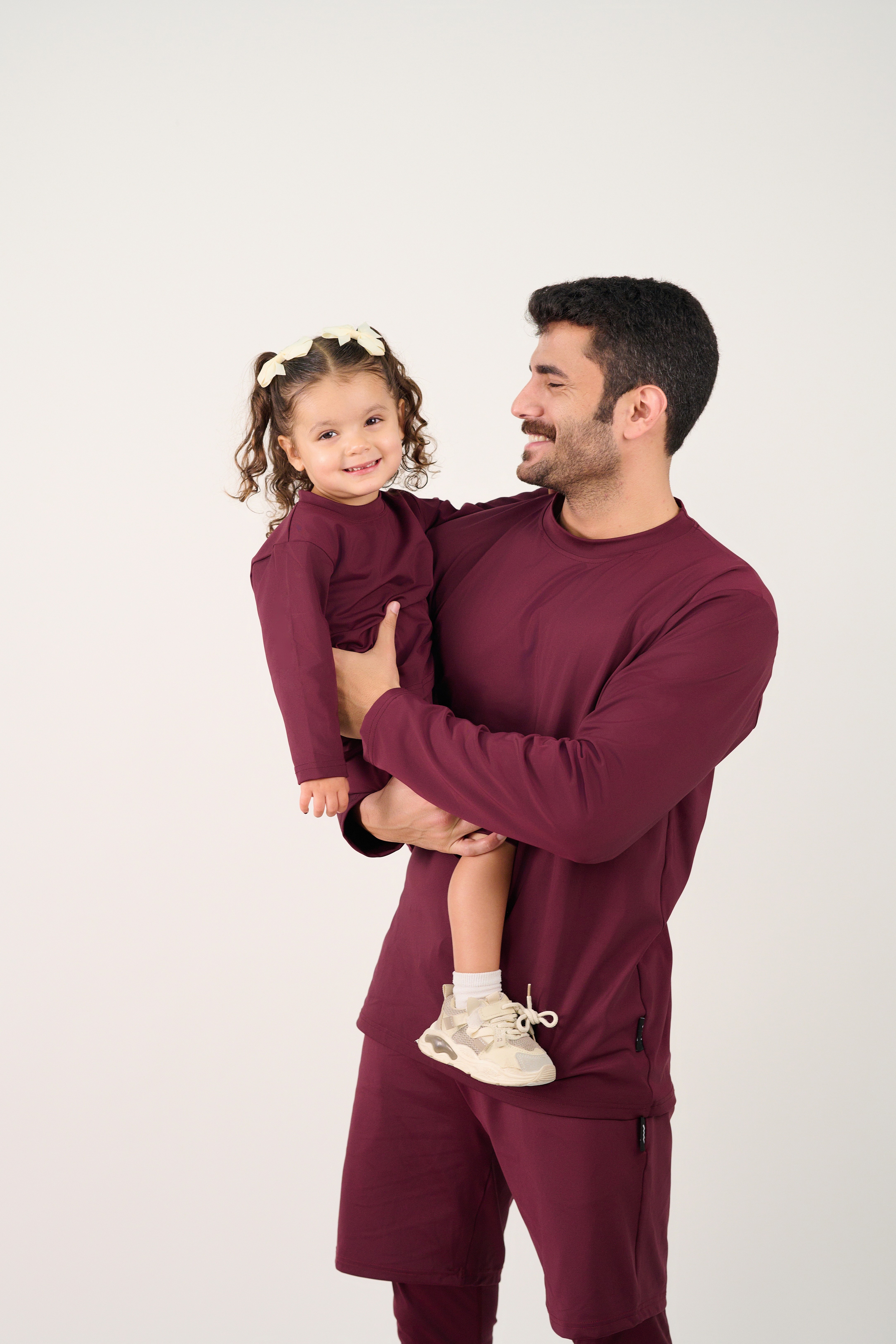 Friends laughing and posing inside a car