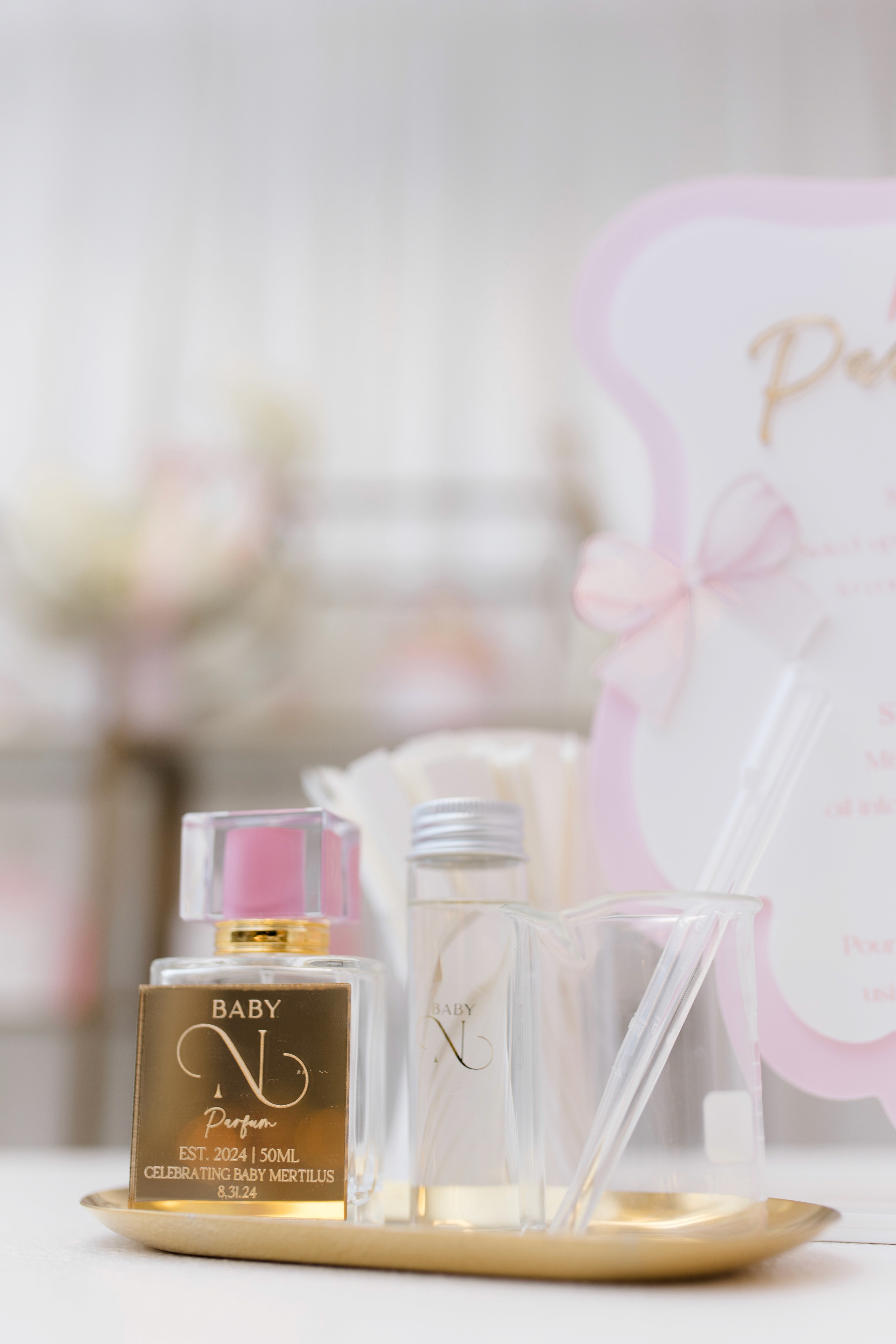 two clear glass perfume bottles