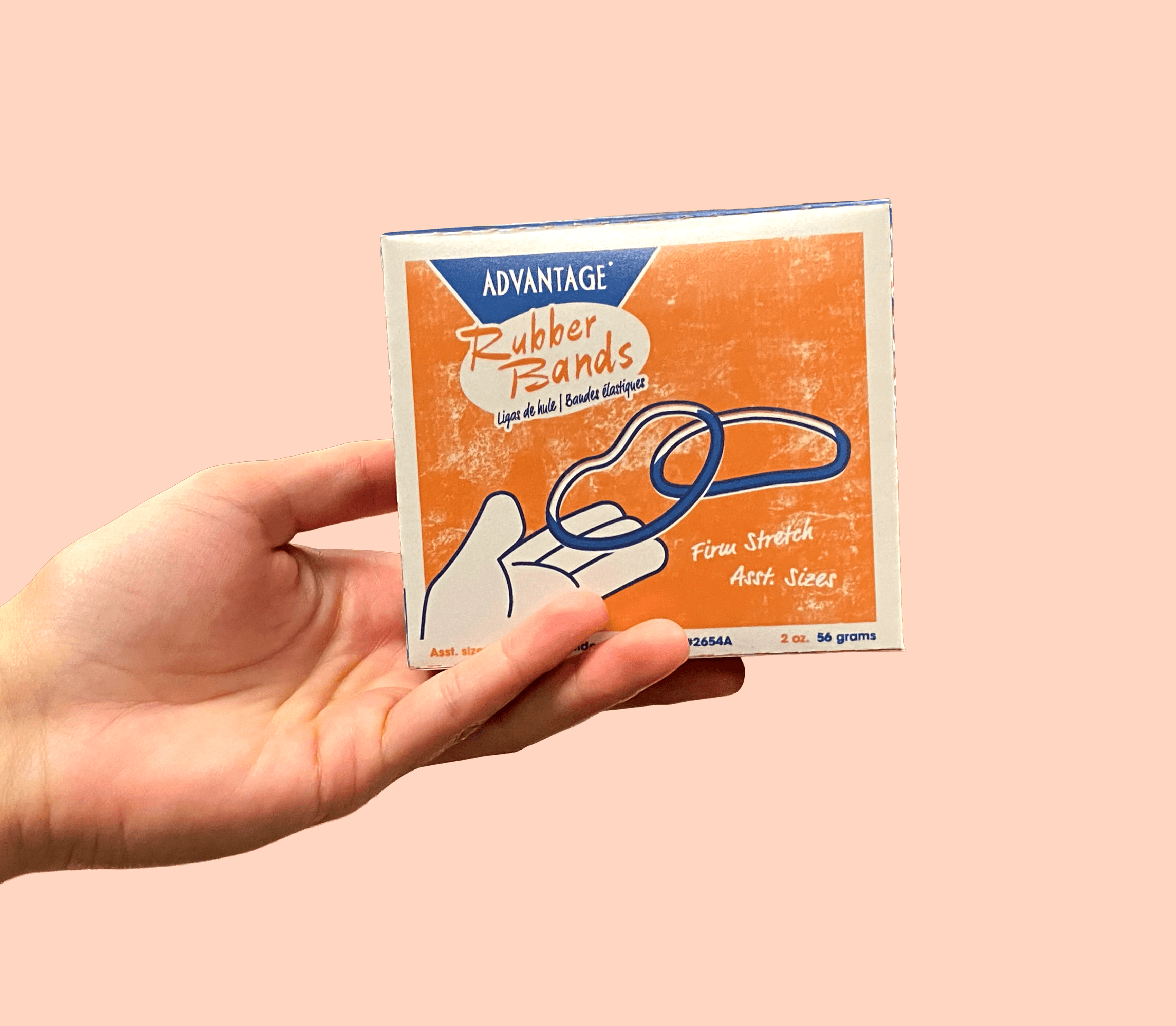 rubber band box held in a hand.