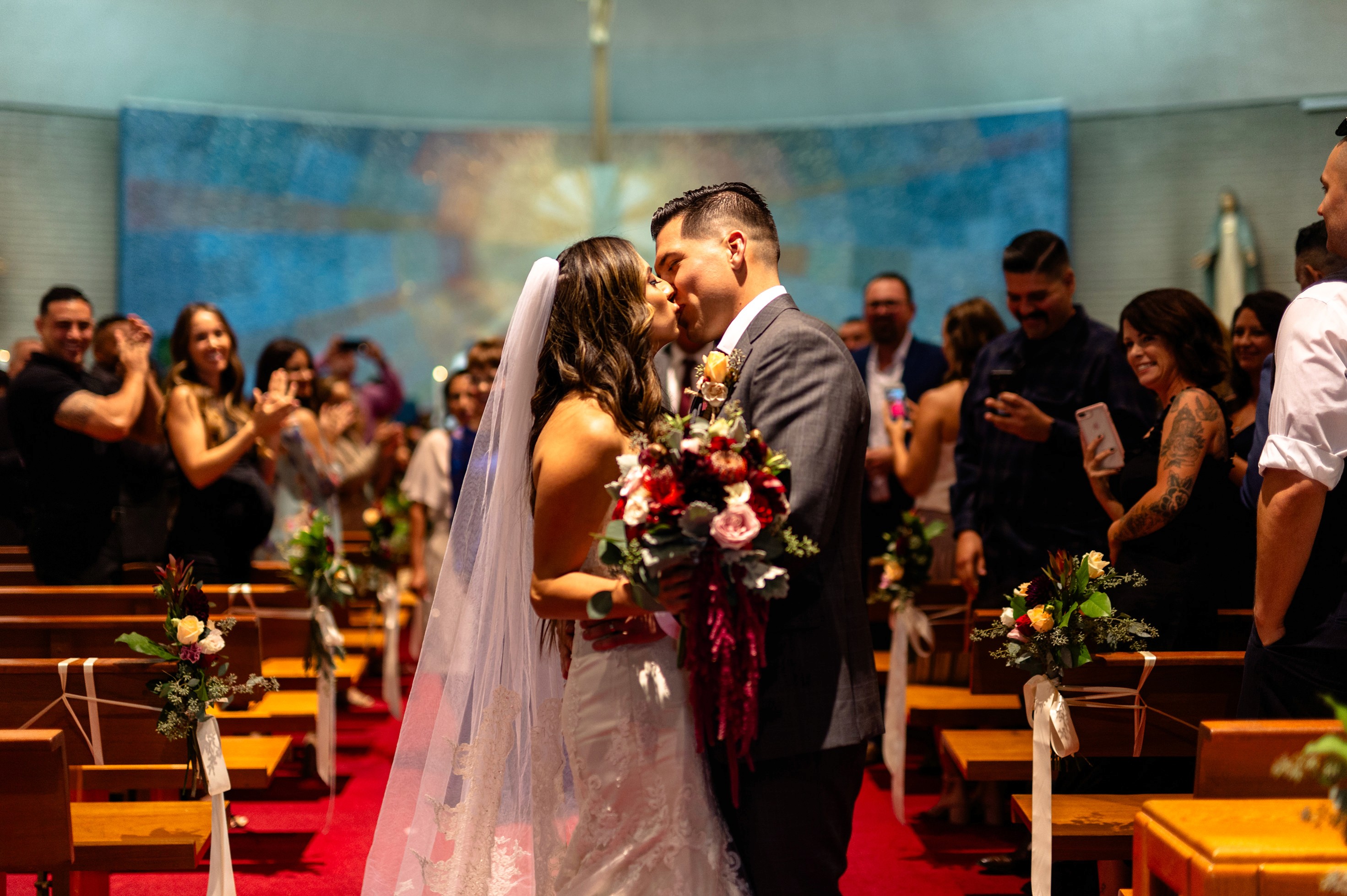 Flat lay wedding details with bouquet, rings, and sparkling bridal heels