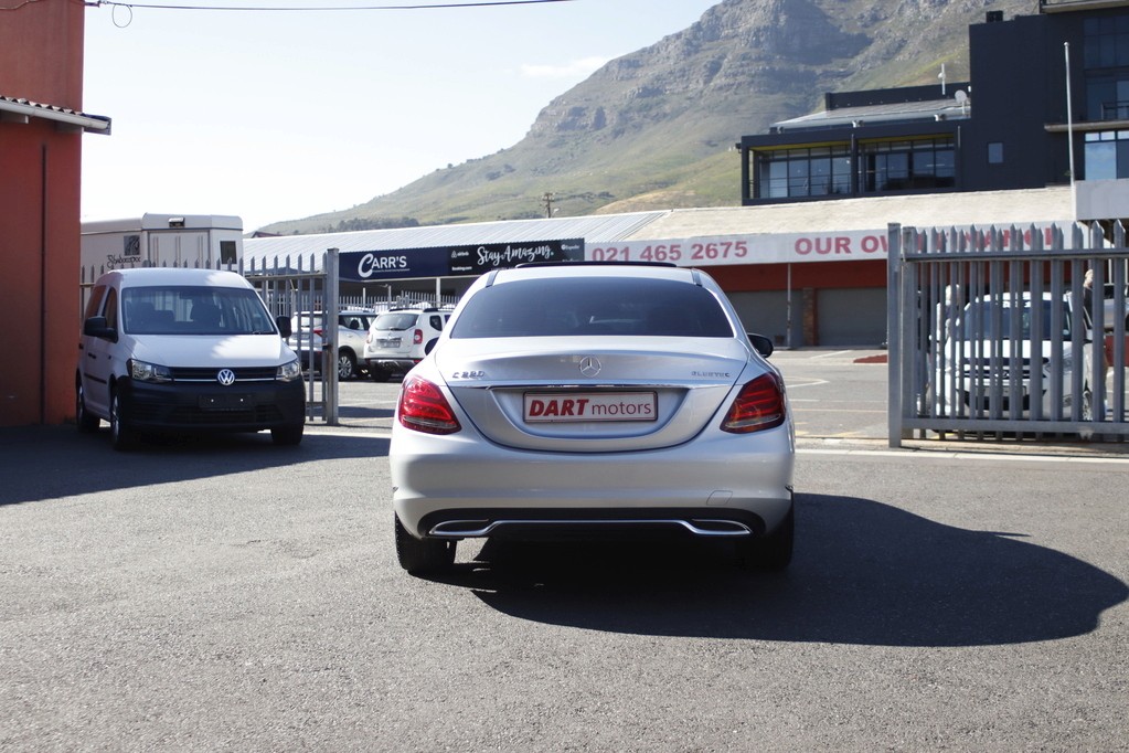 man in white crew neck shirt wearing black framed eyeglasses