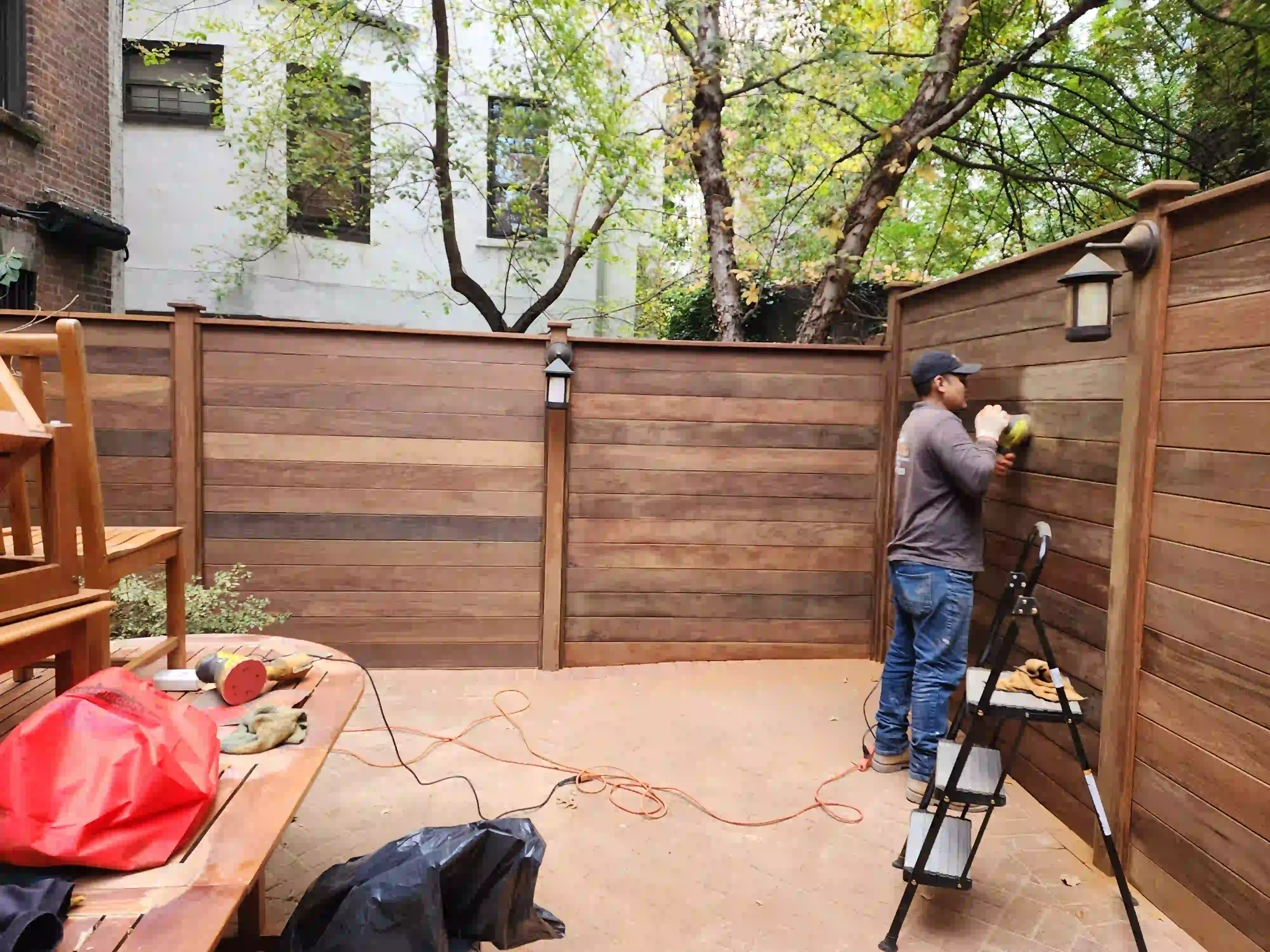 During Ipe fencing installation by Jewel Construction Company in Upper West Side, NYC