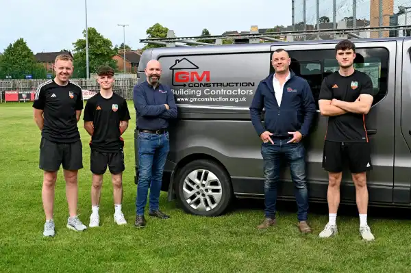 GM Construction owner with Banbridge Town players