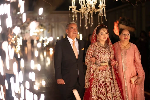 Professional wedding photographer in Lahore covering a grand wedding event