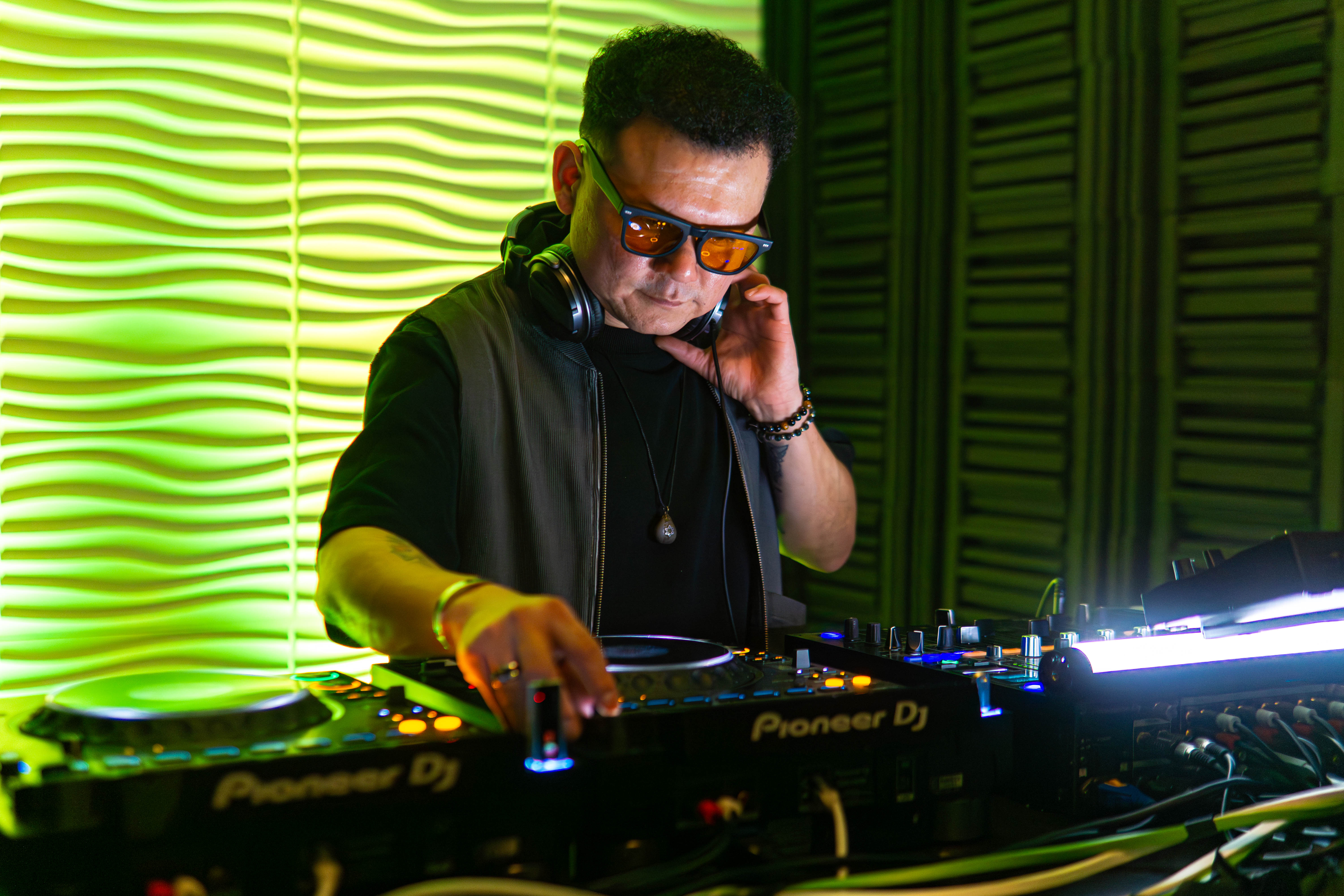 Rachel, personal trainer, looking to the side confidently in a fitness studio