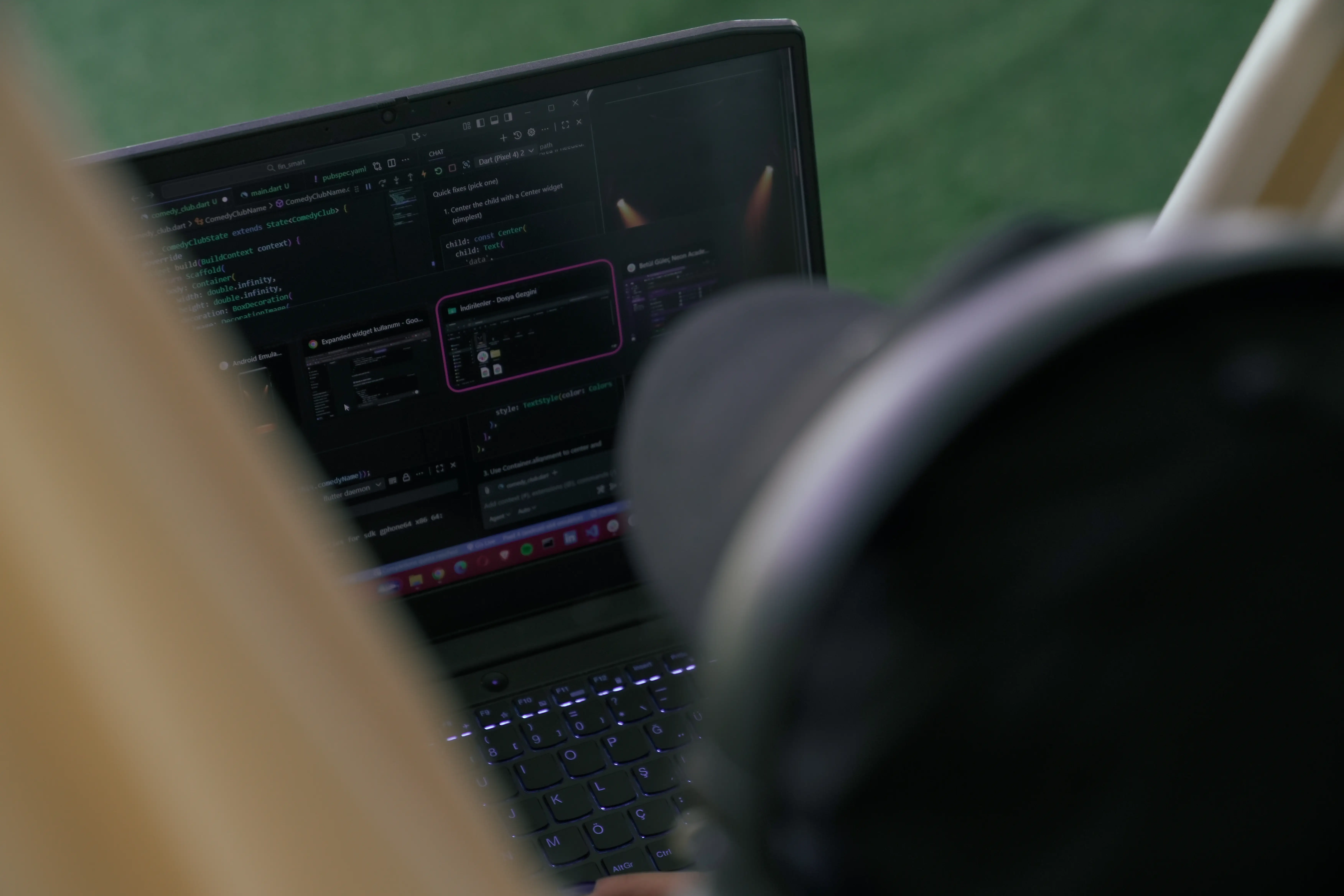 Developer building a Next.js web application at the Neon Apps office