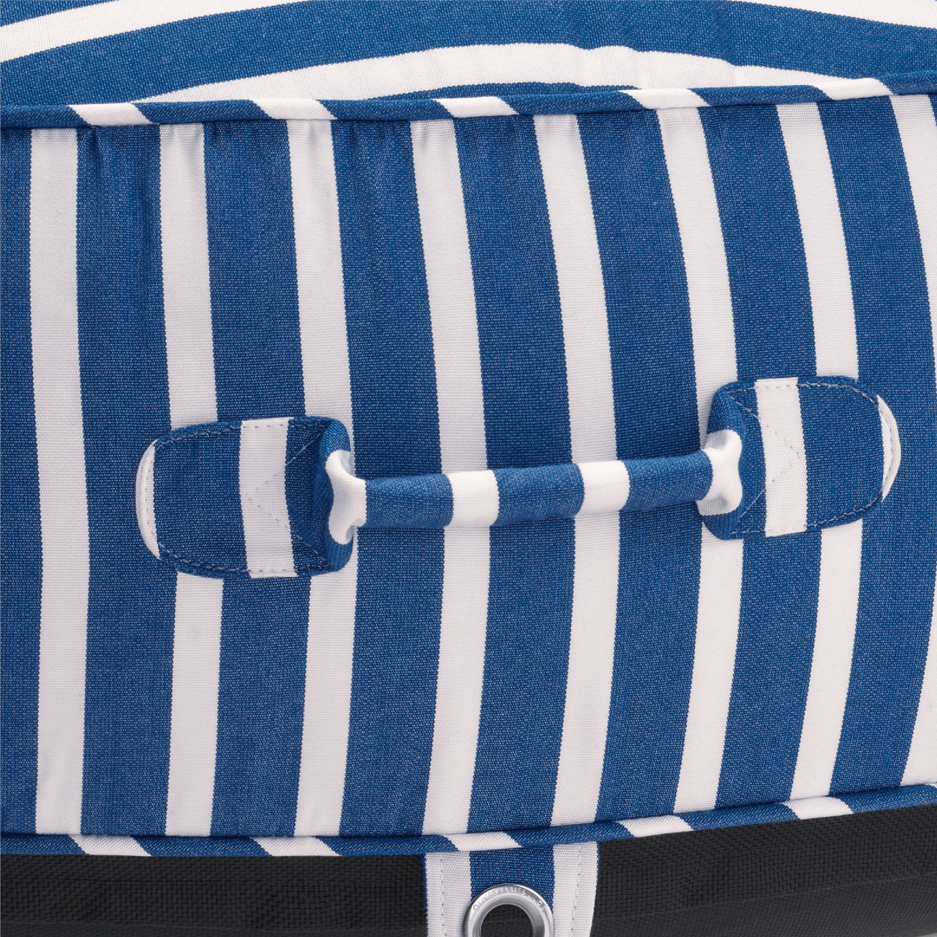 Close-up of a pool float with blue-and-white canvas handle, topstitched seams, and stainless eyelet