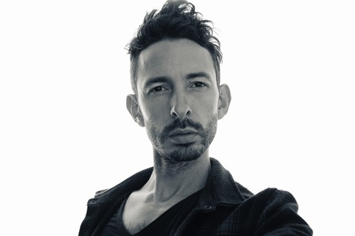 Warm and approachable headshot of photographer Brian DeSimone, smiling genuinely. Demonstrates the "psychological safety" and connection he brings to executive portrait sessions in the Bay Area.