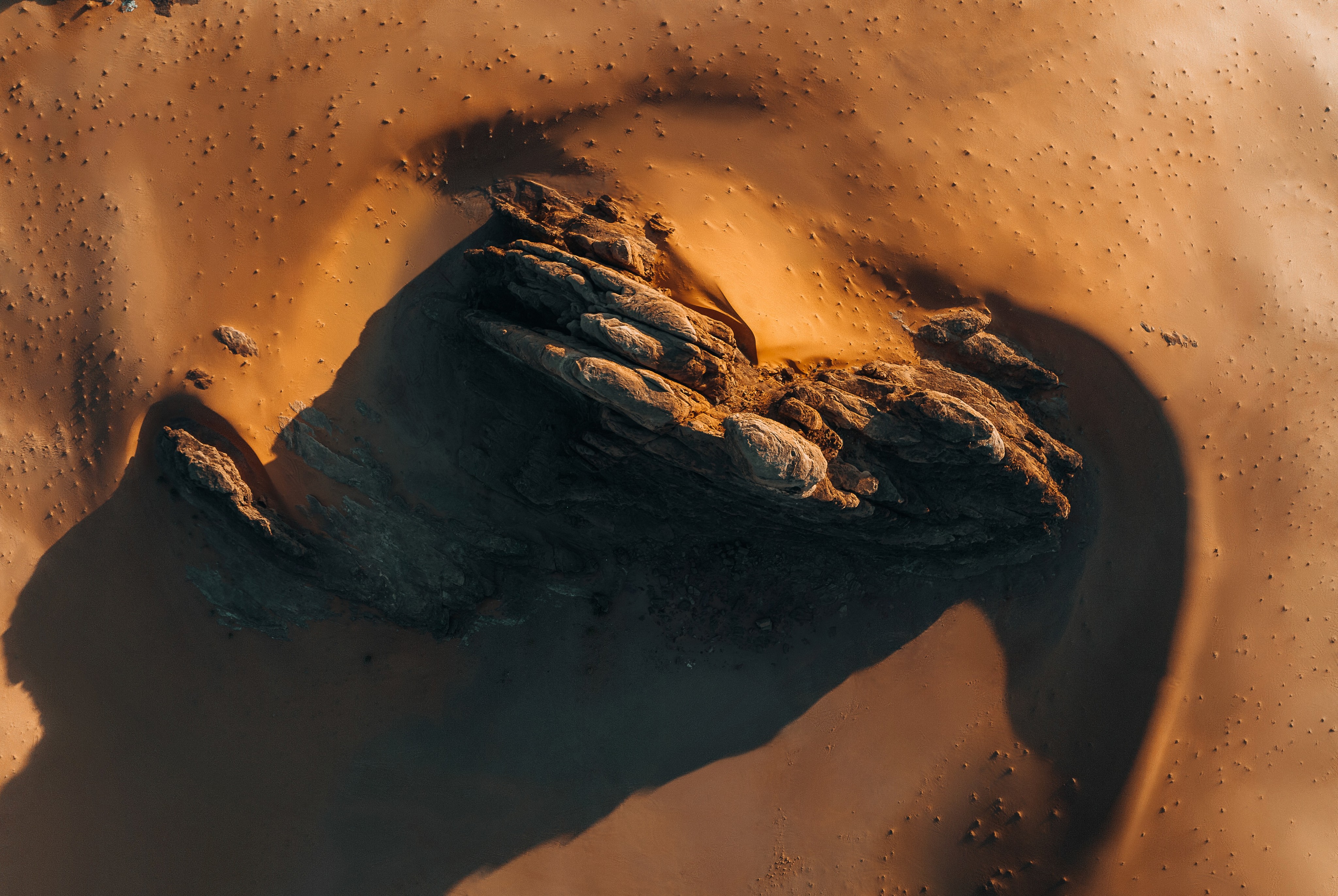 A rock in dessert - photo from above