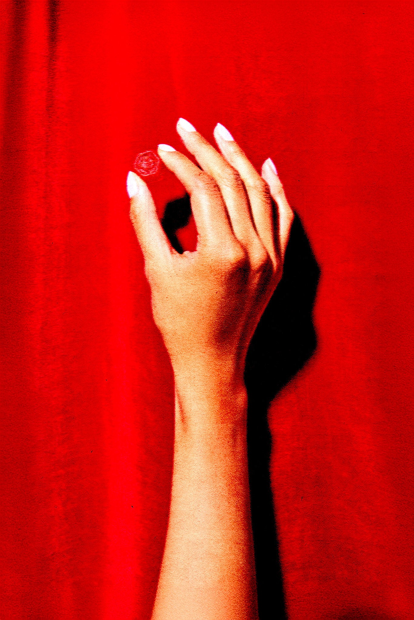 Athletes resting on a blue running track.