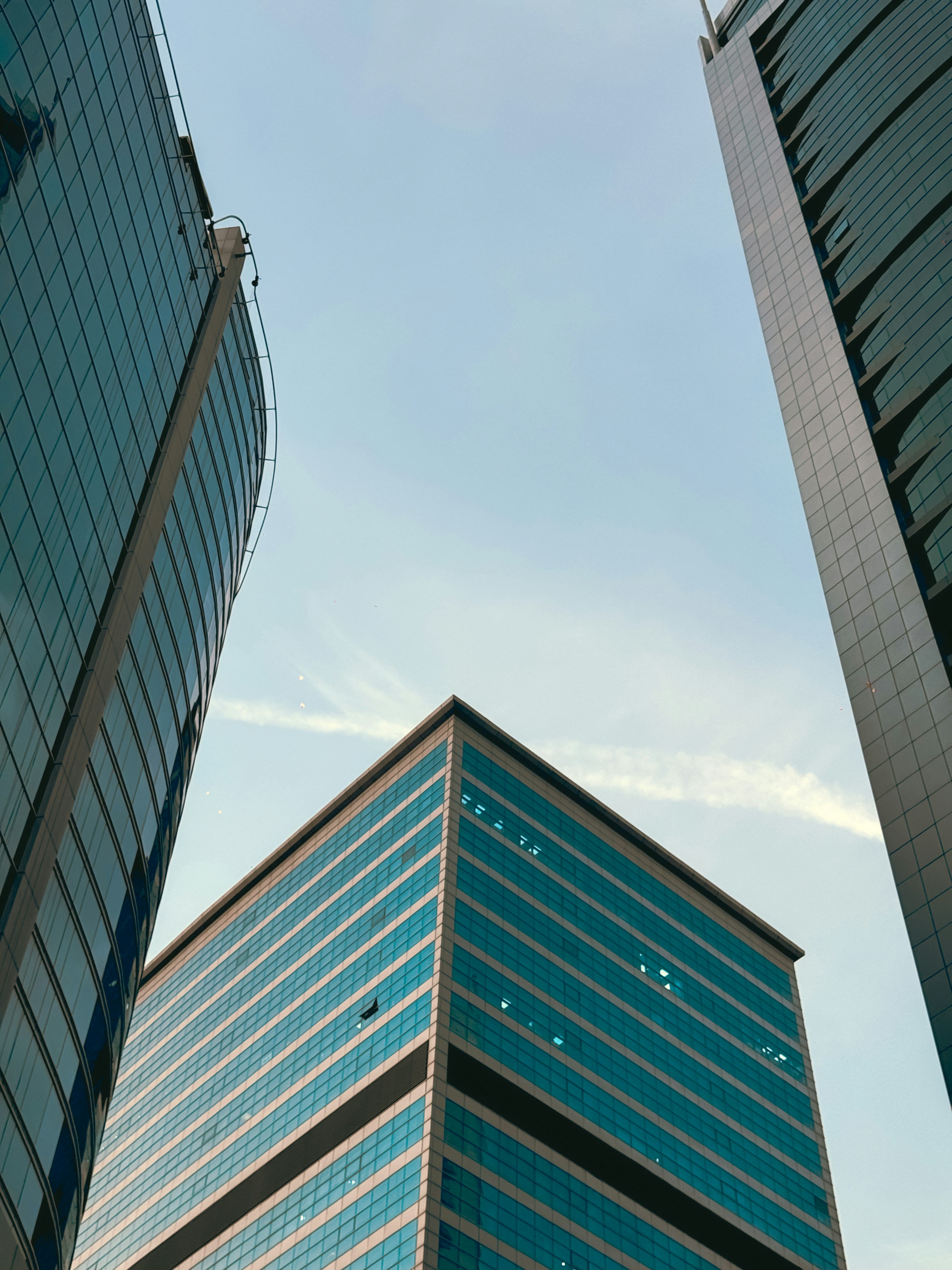 Modern skyscrapers with a blue sky background.