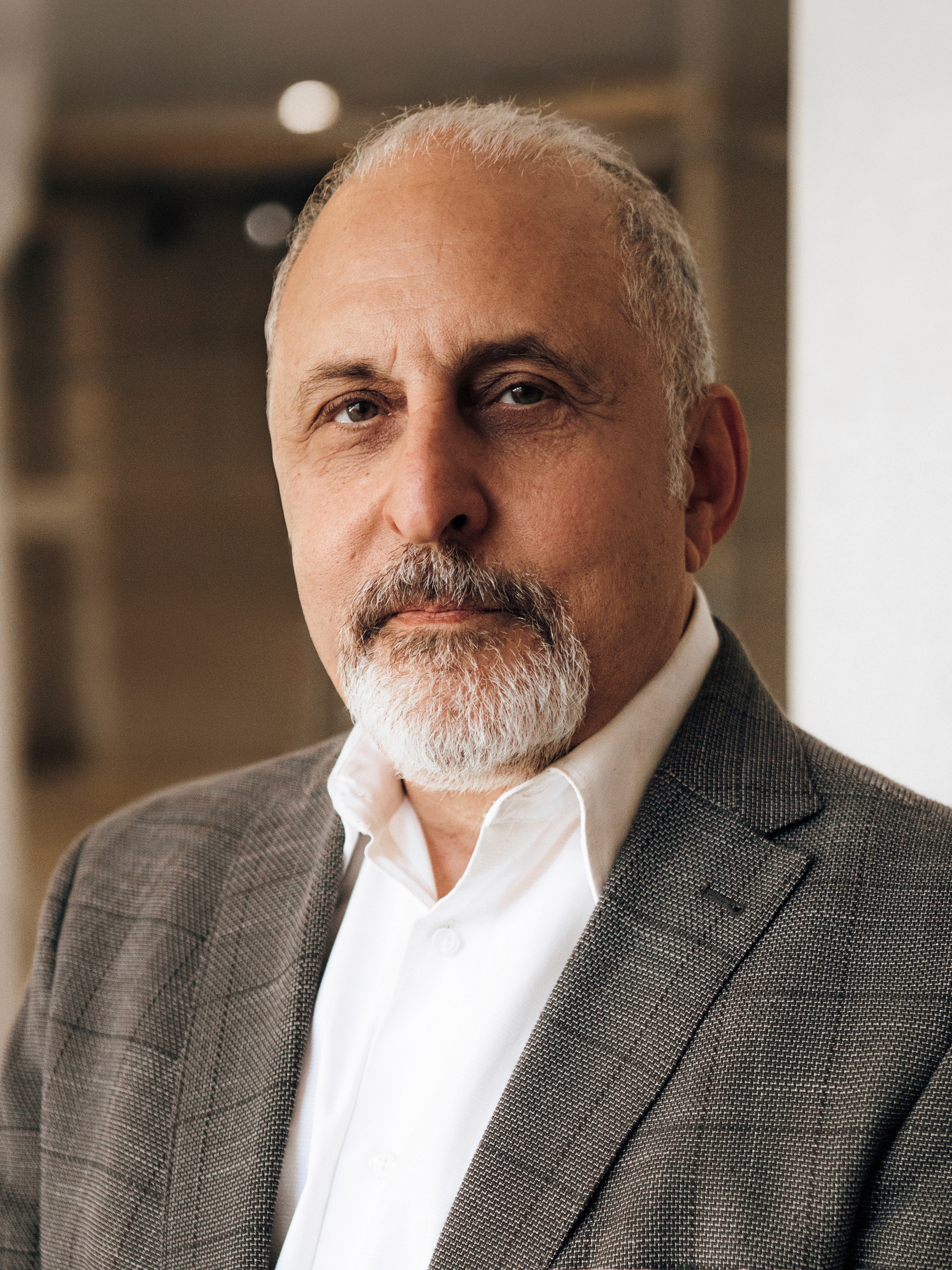 man wearing white V-neck shirt