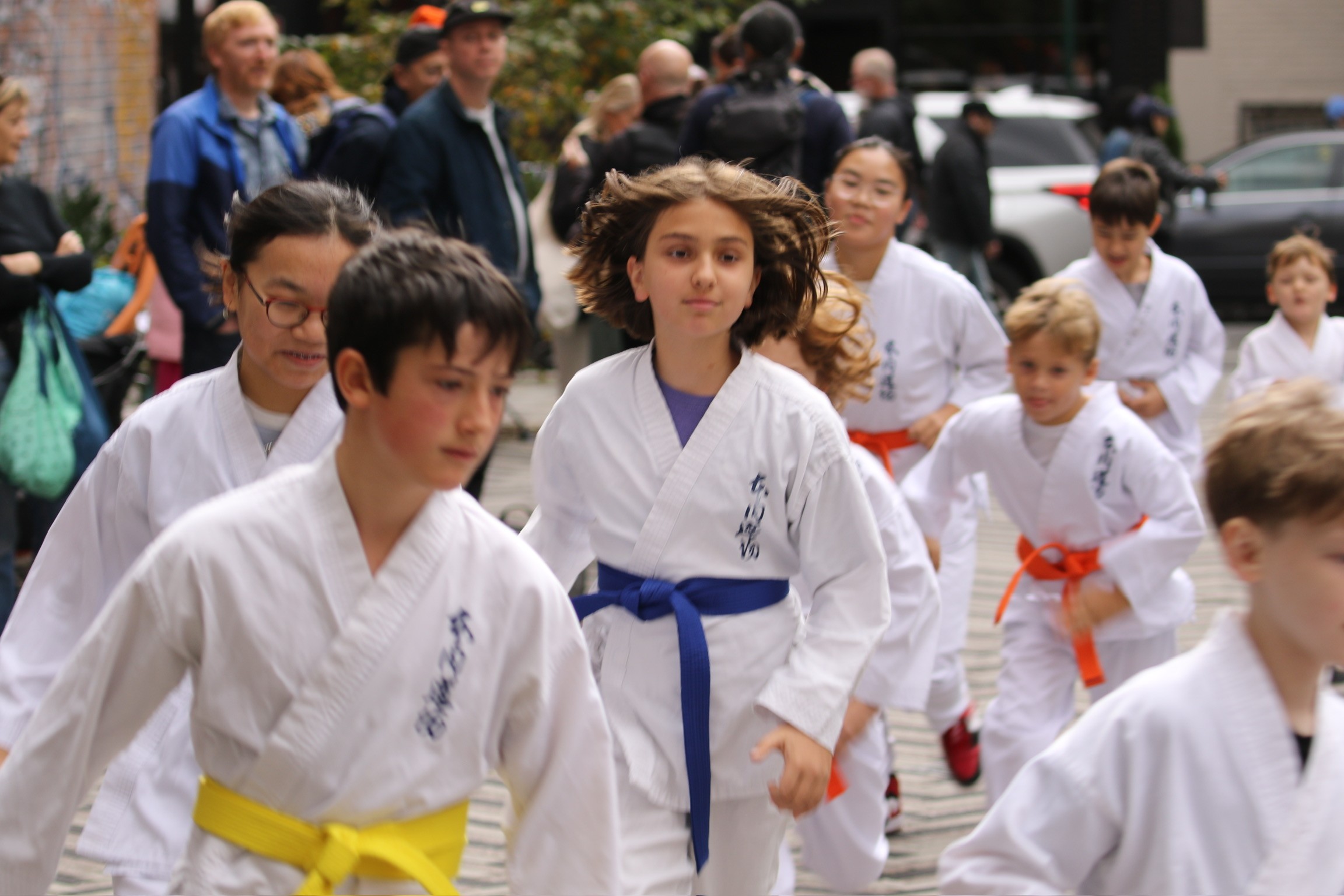Person in fog with a glowing, glitching computer monitor head, dark cyberpunk portrait.
