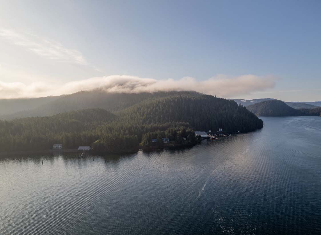 WTADS client Waterfall Resort Alaska lake trees landscape.