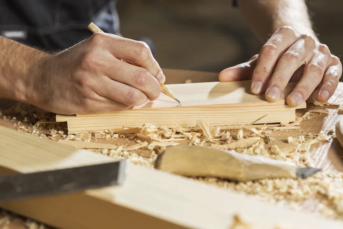 Marking a board in the workshop next door
