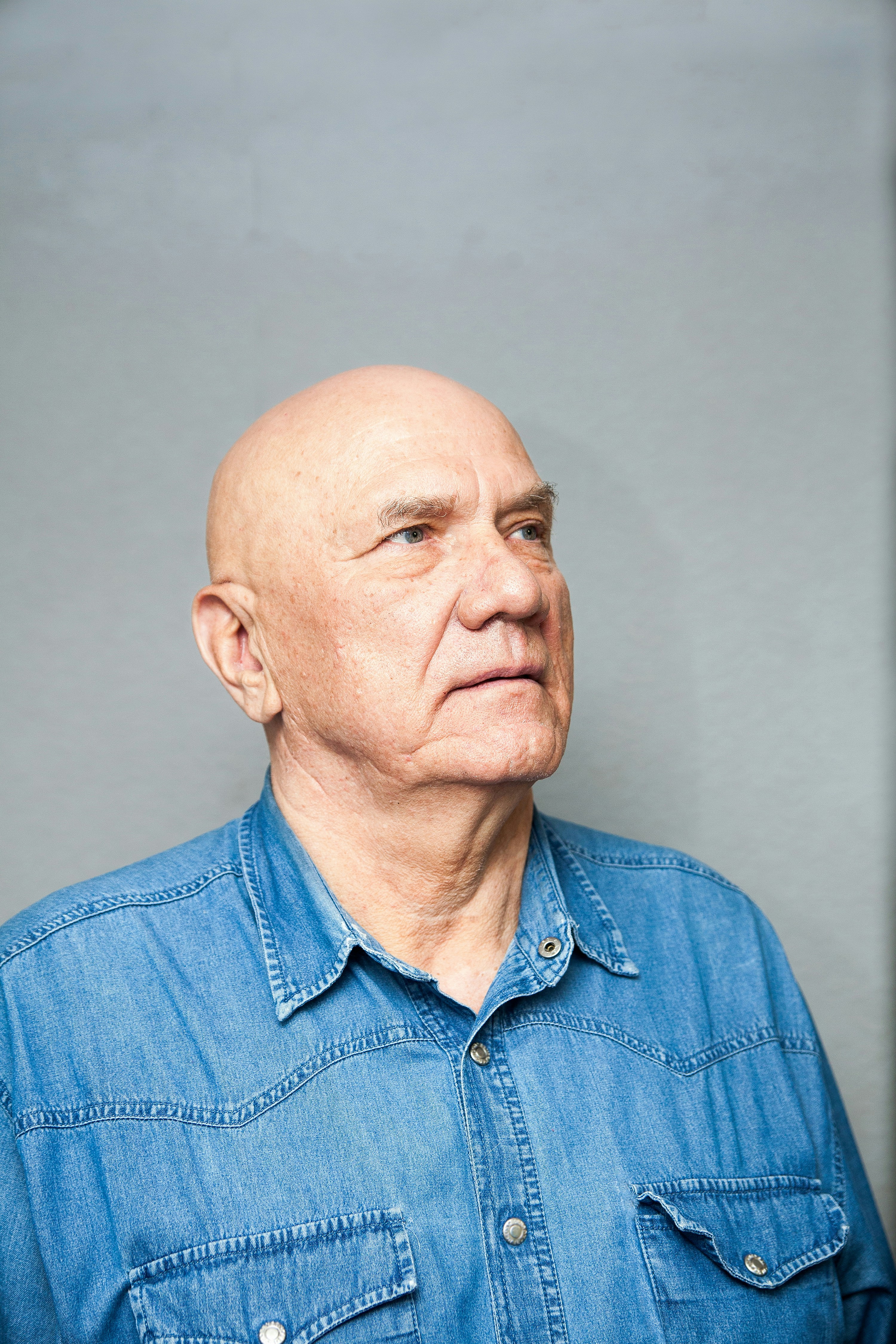 a man in a blue shirt