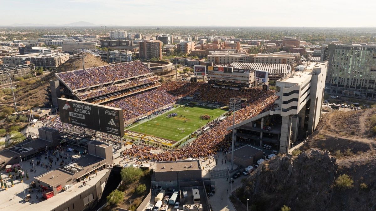 a black and white living room with a large tv