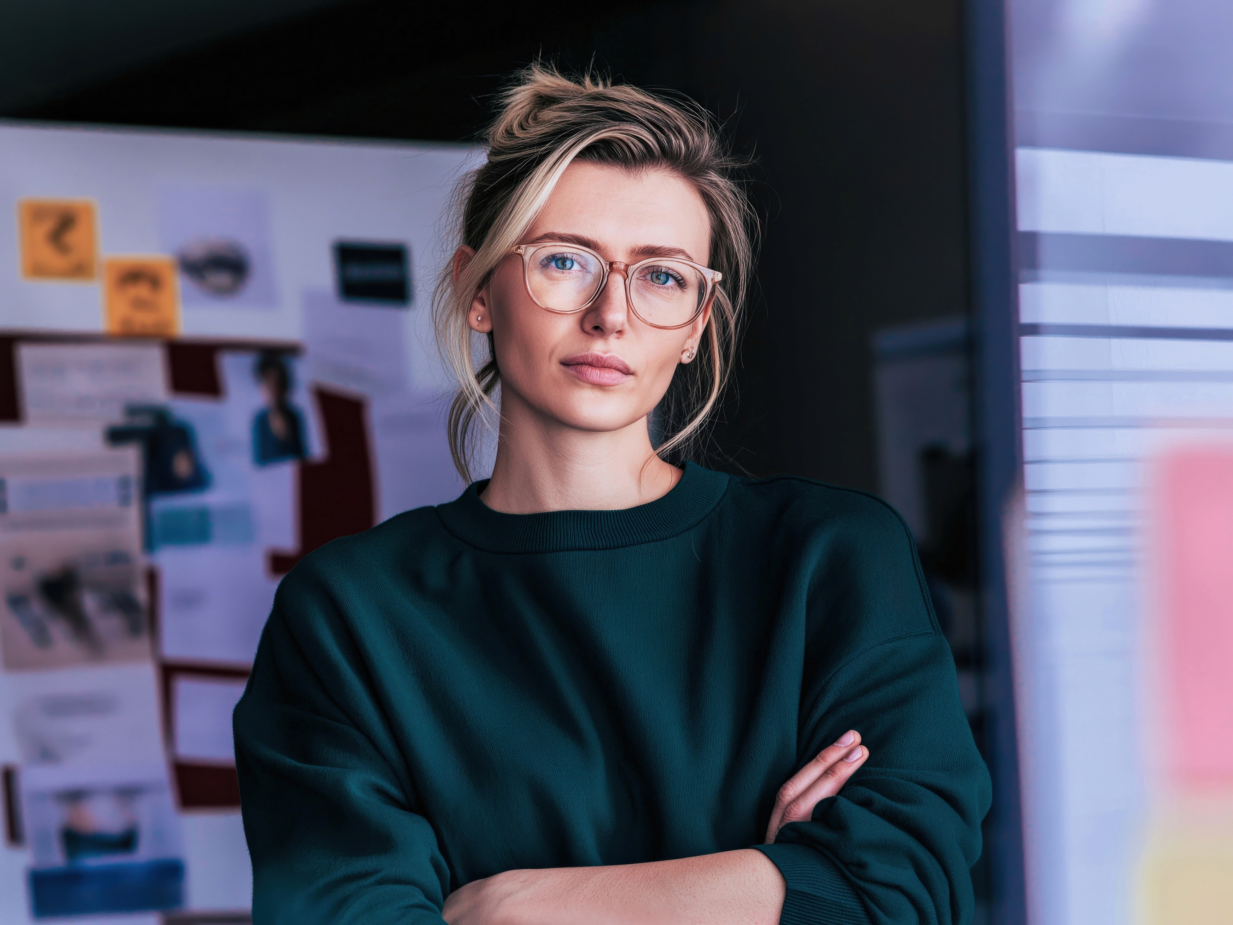Editorial portrait of a data scientist representing teams responsible for evaluating and governing AI systems.