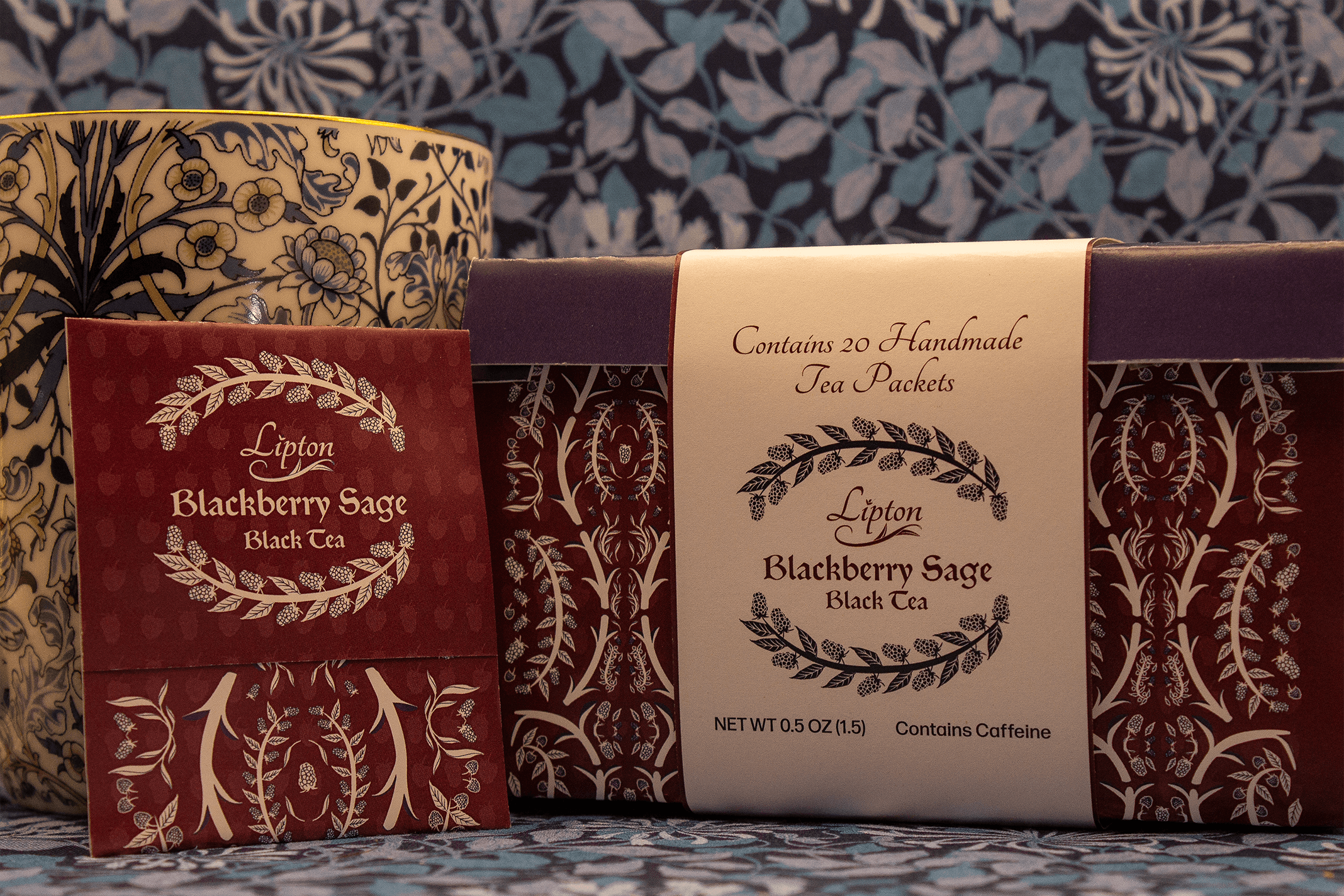 Lipton tea packaging inspired by William Morris – burgundy and cream boxes with botanical patterns and ornate typography