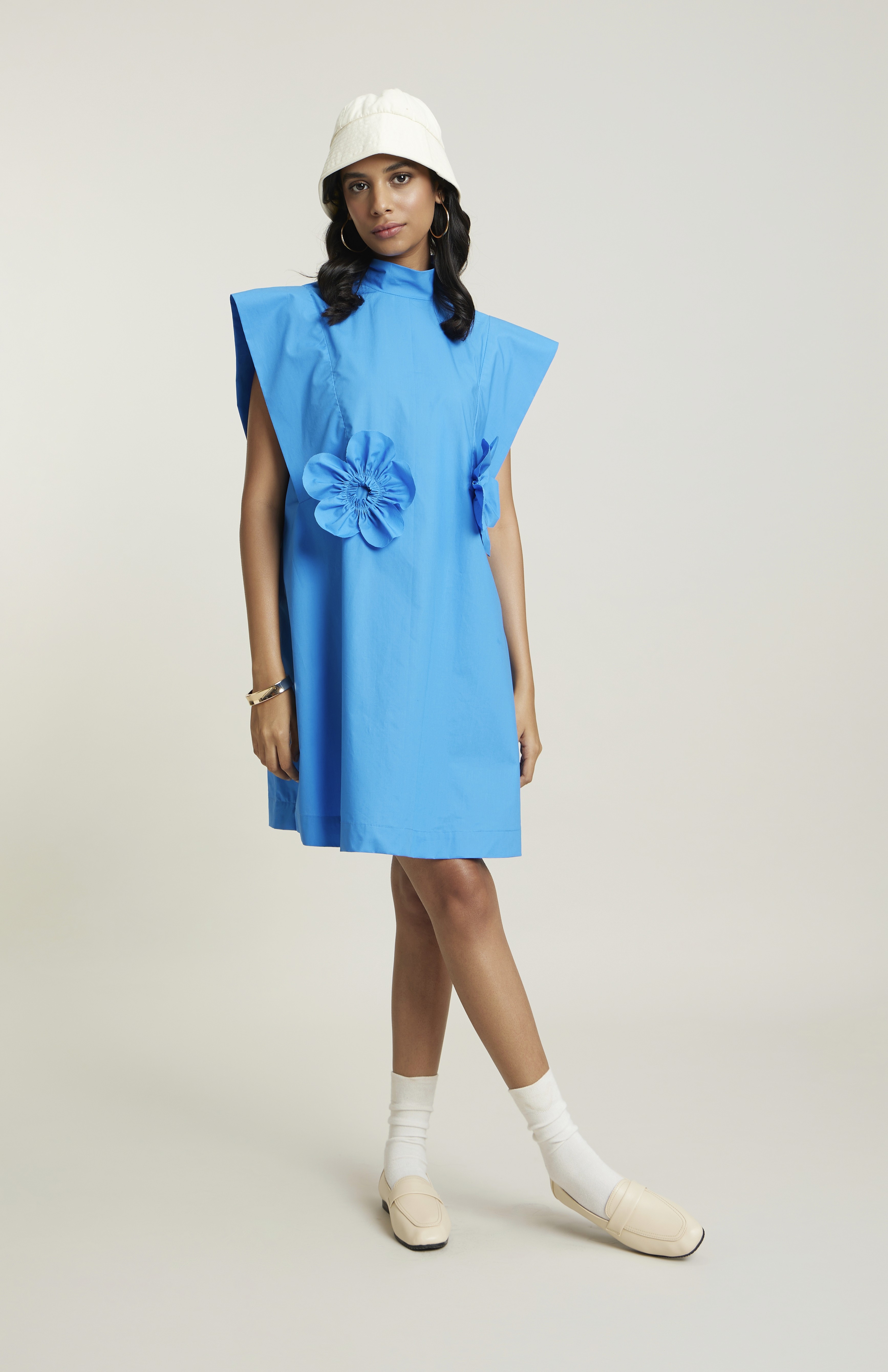 Friends laughing and posing inside a car