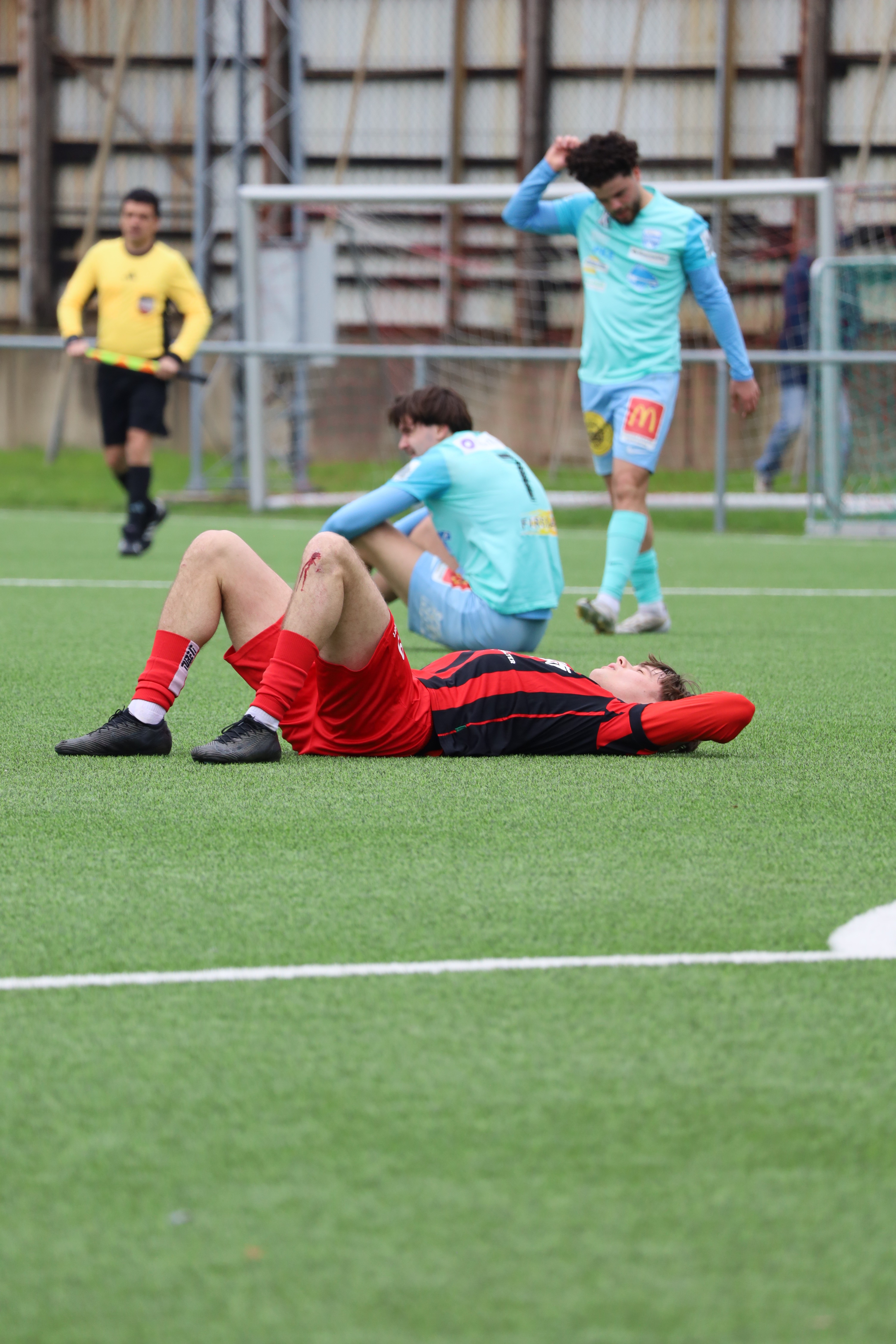 Player lies on the back on the ground