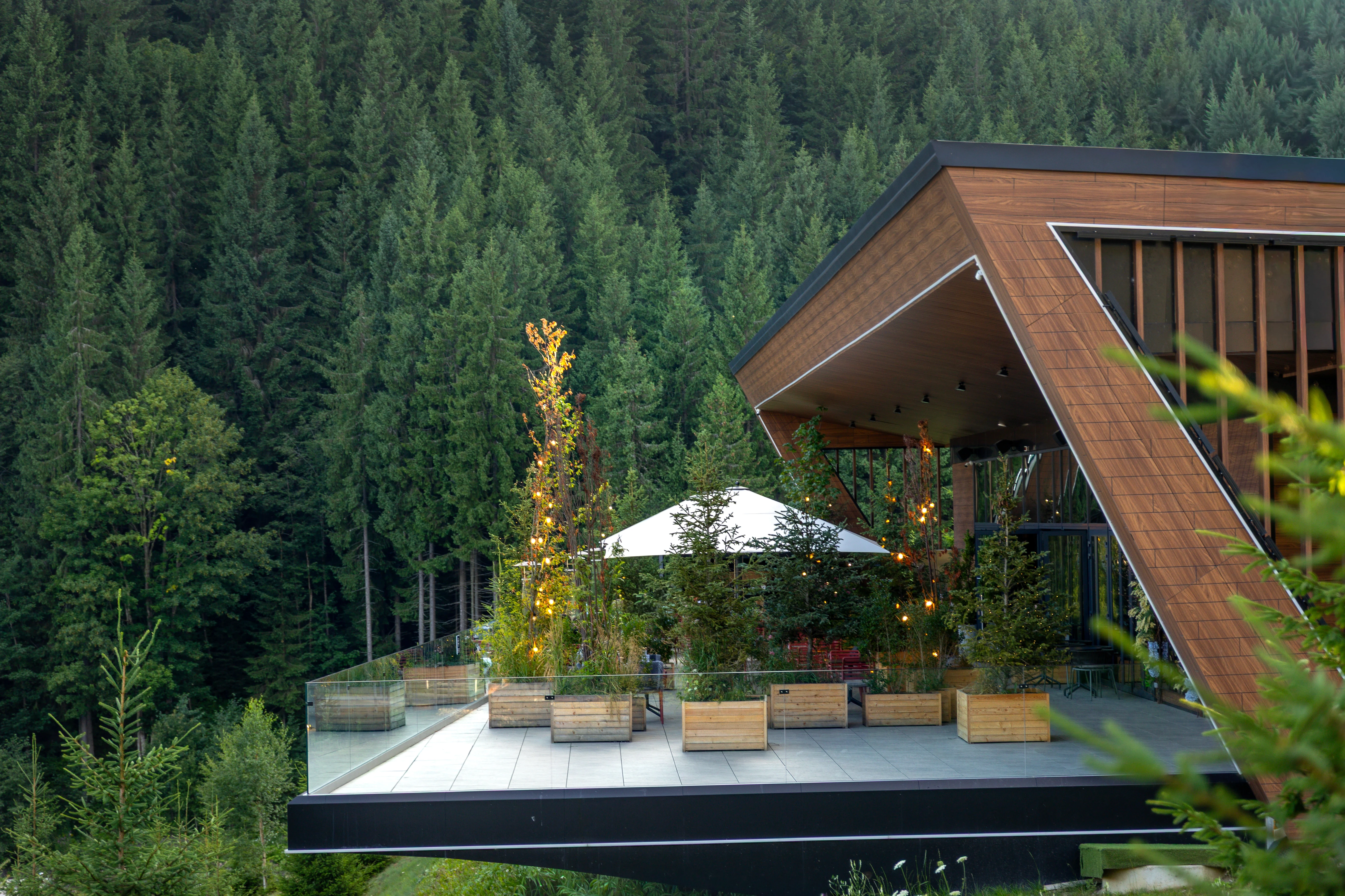 modern-wooden-house-mountains-terrace-with-panoramic-view