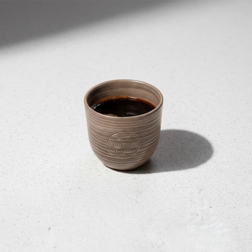 white muffin tray on top of white ceramic mug