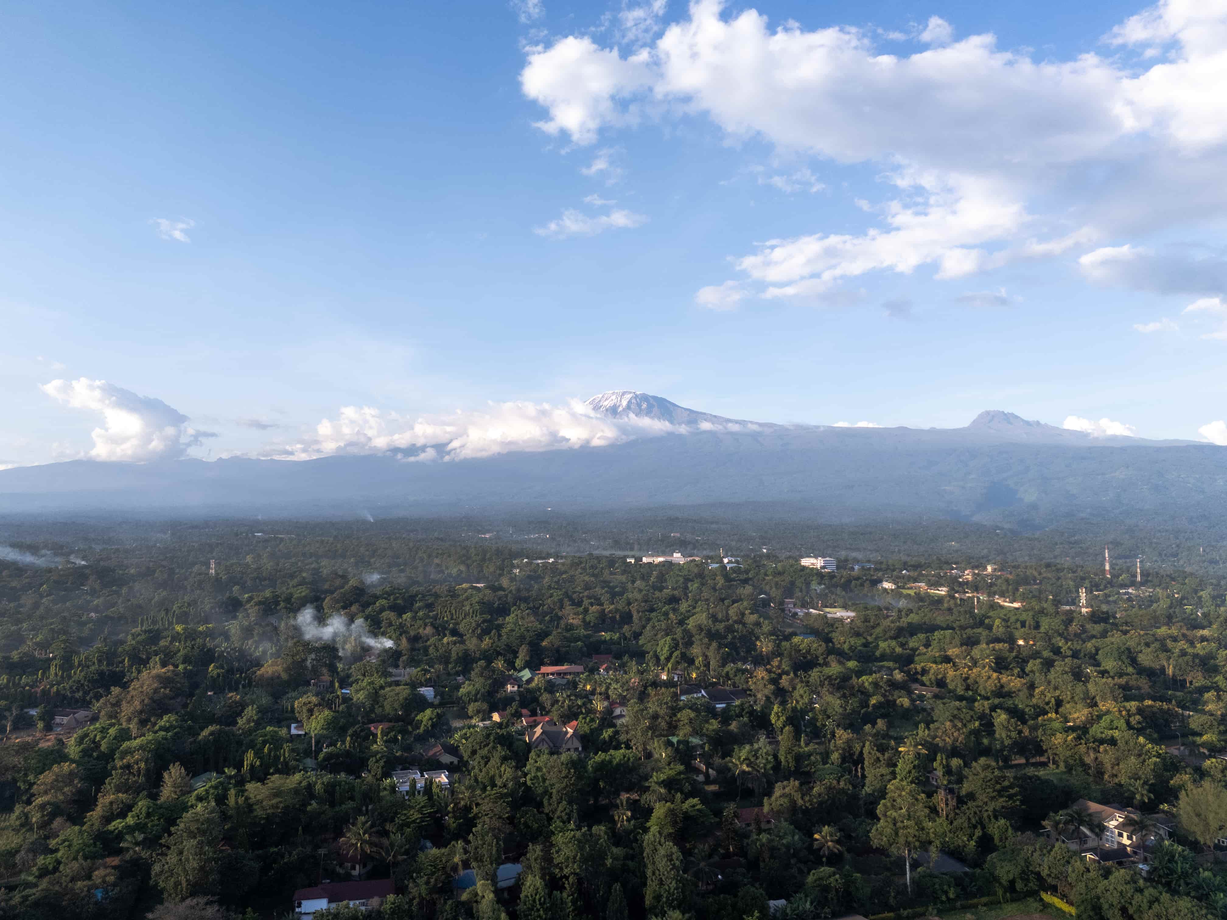 Mount Kilimanjaro rising above the surrounding Tanzanian landscape, the highest free-standing mountain in the world.