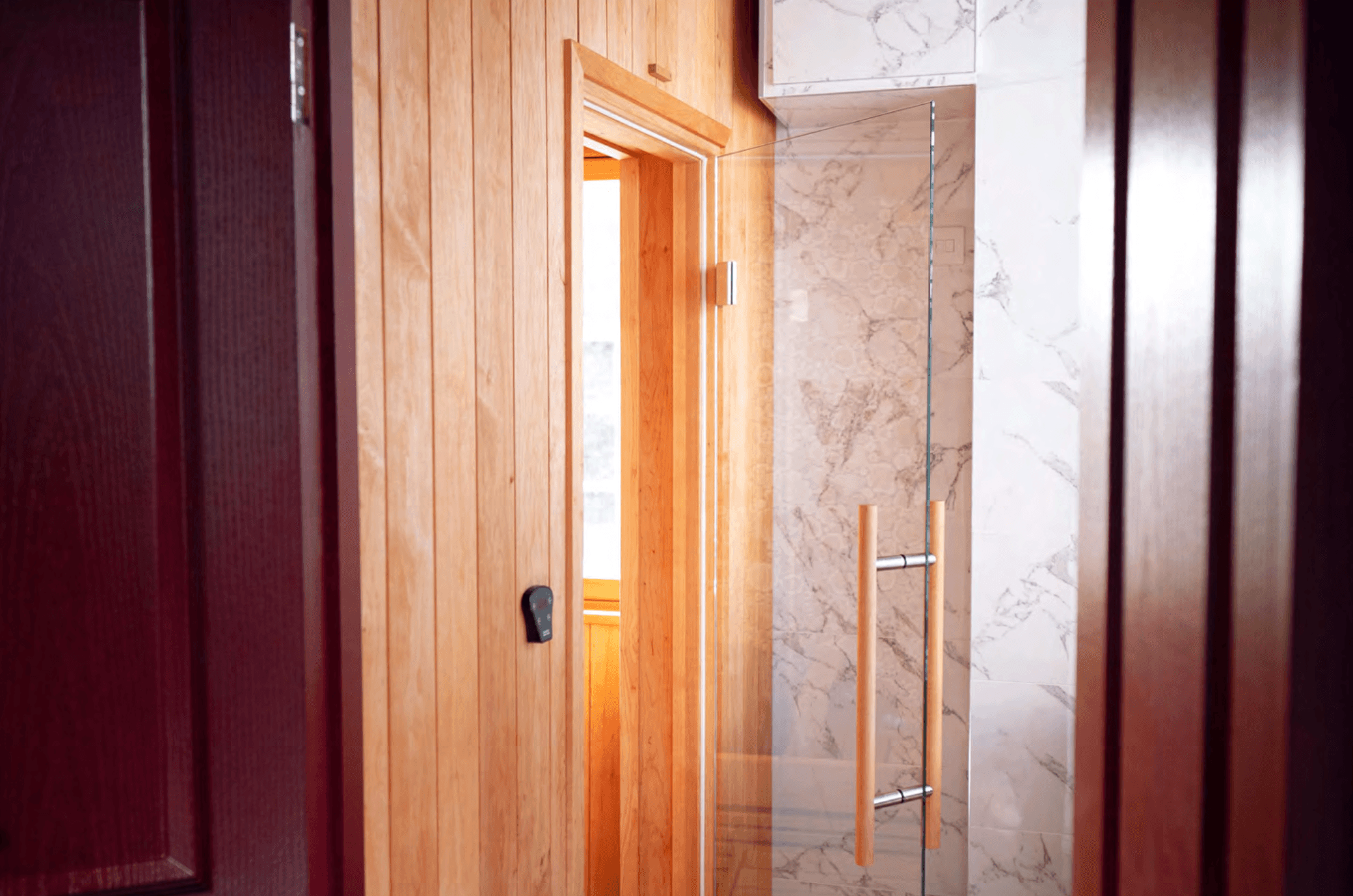 brown towel on white ceramic wall tiles