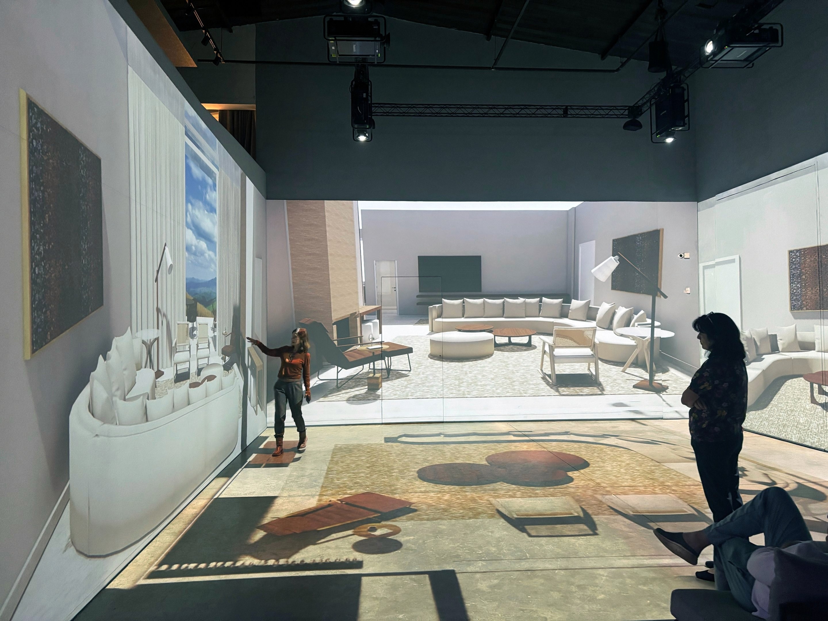 Contemporary interior with sculpted angled walls and a skylight filling the space with natural light.
