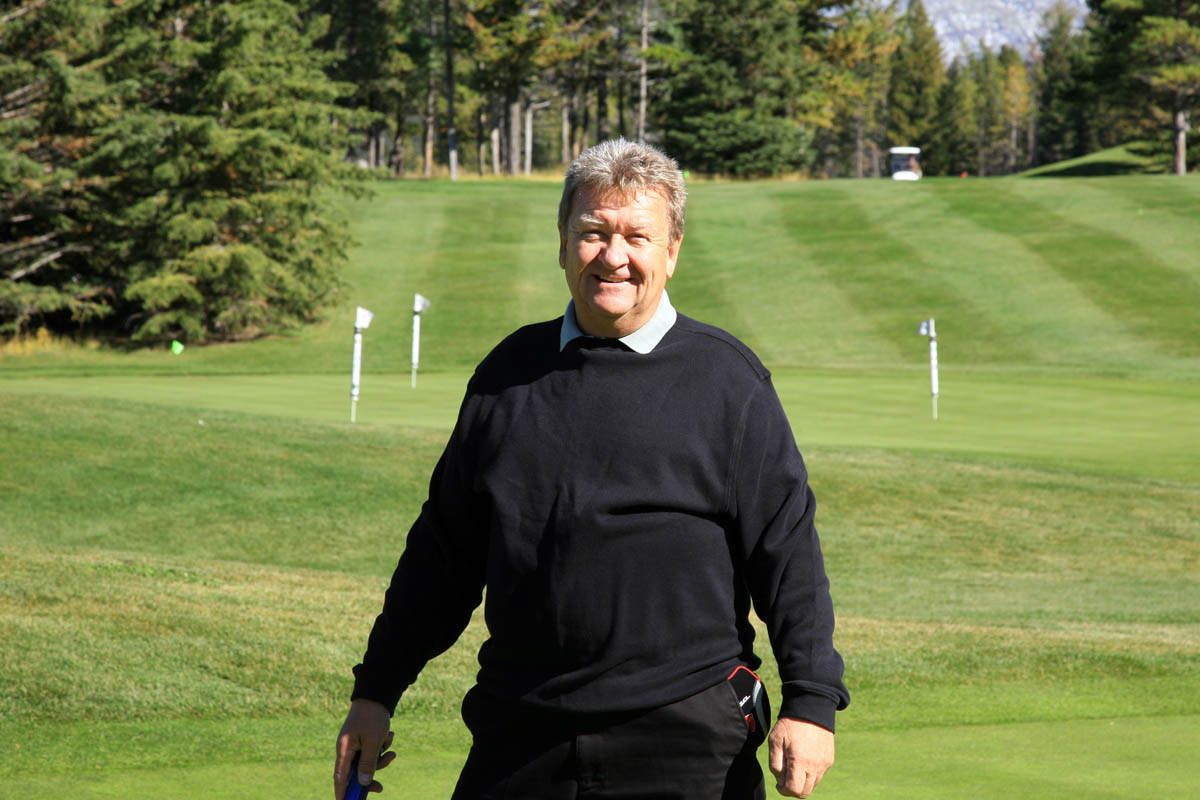 A man with surfboard