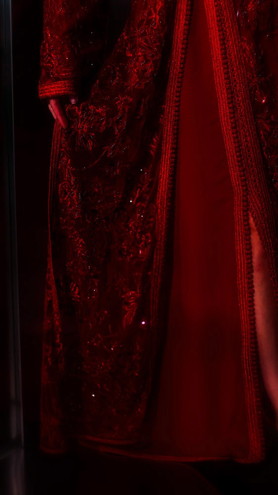 Crimson Moroccan caftan with rich handcrafted detailing, luxury evening wear designed for Bahrain and Gulf clients
