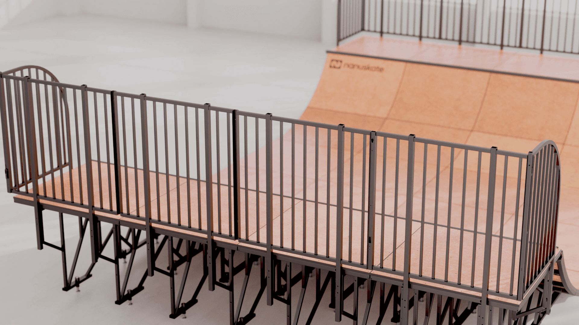 nanuskate mini ramp with skatelite surface and metal railings, designed for skateboarding and extreme sports enthusiasts.