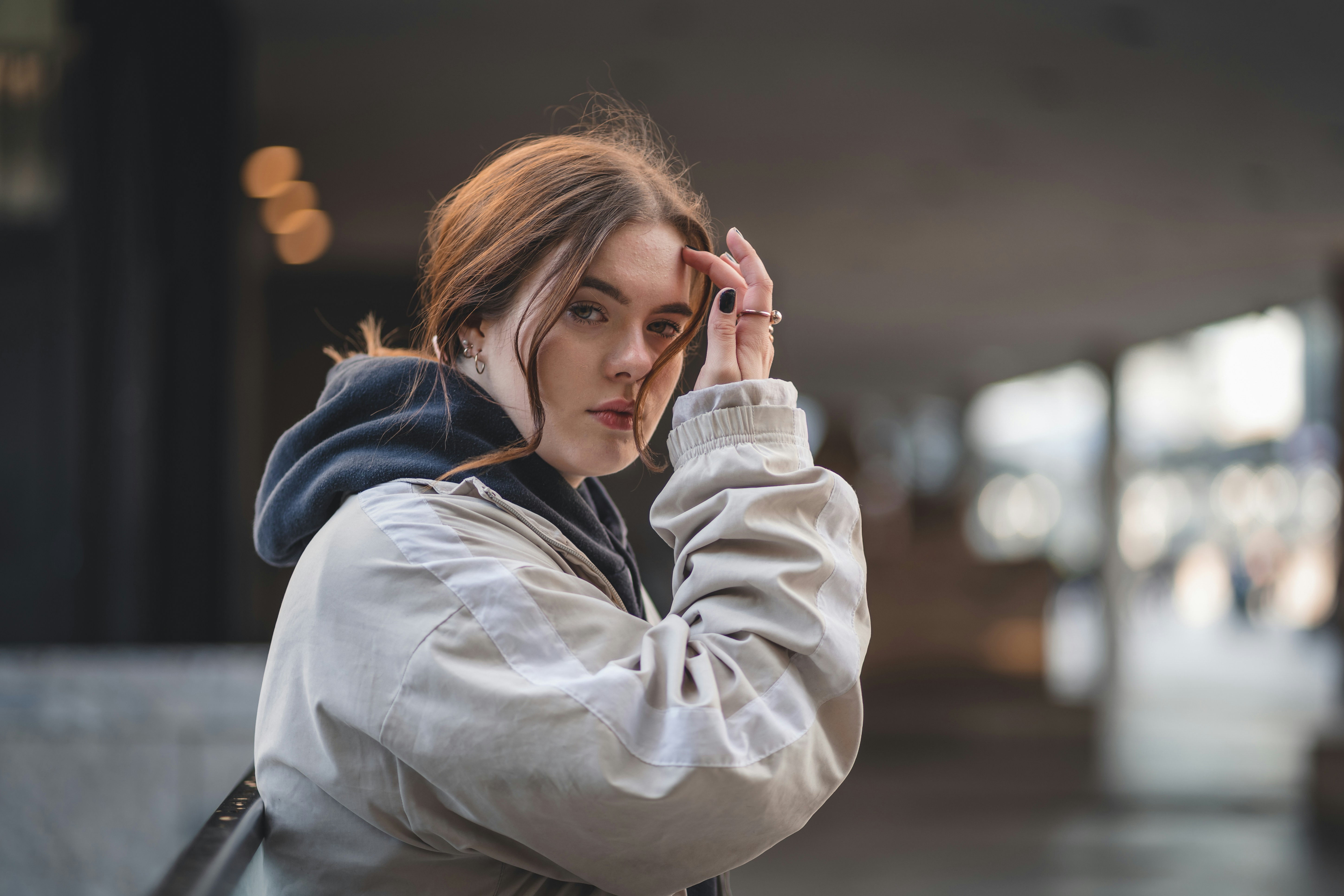 woman waiting for her train - German Skincare Brands