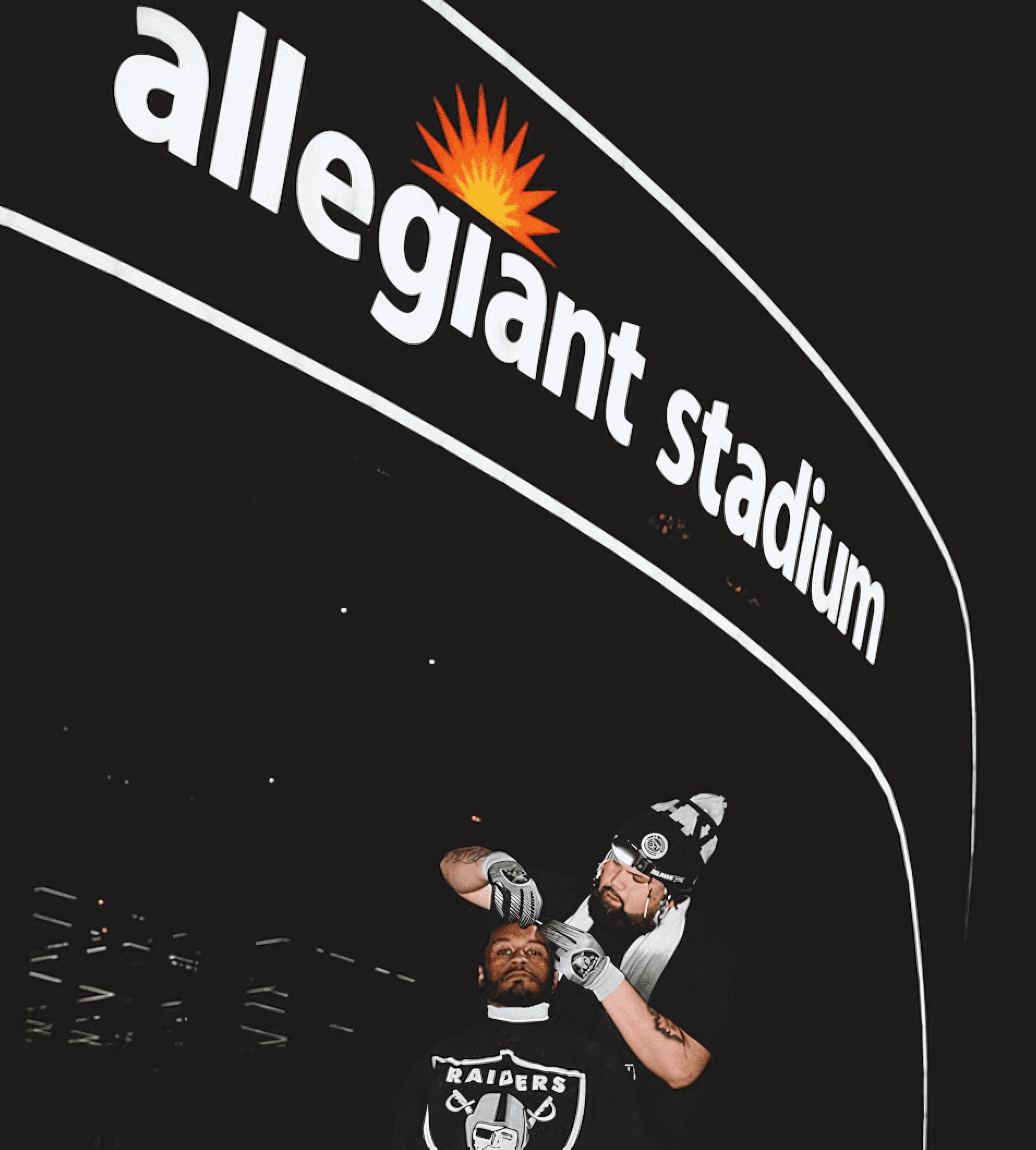 Barber styling a red-bearded man's hair