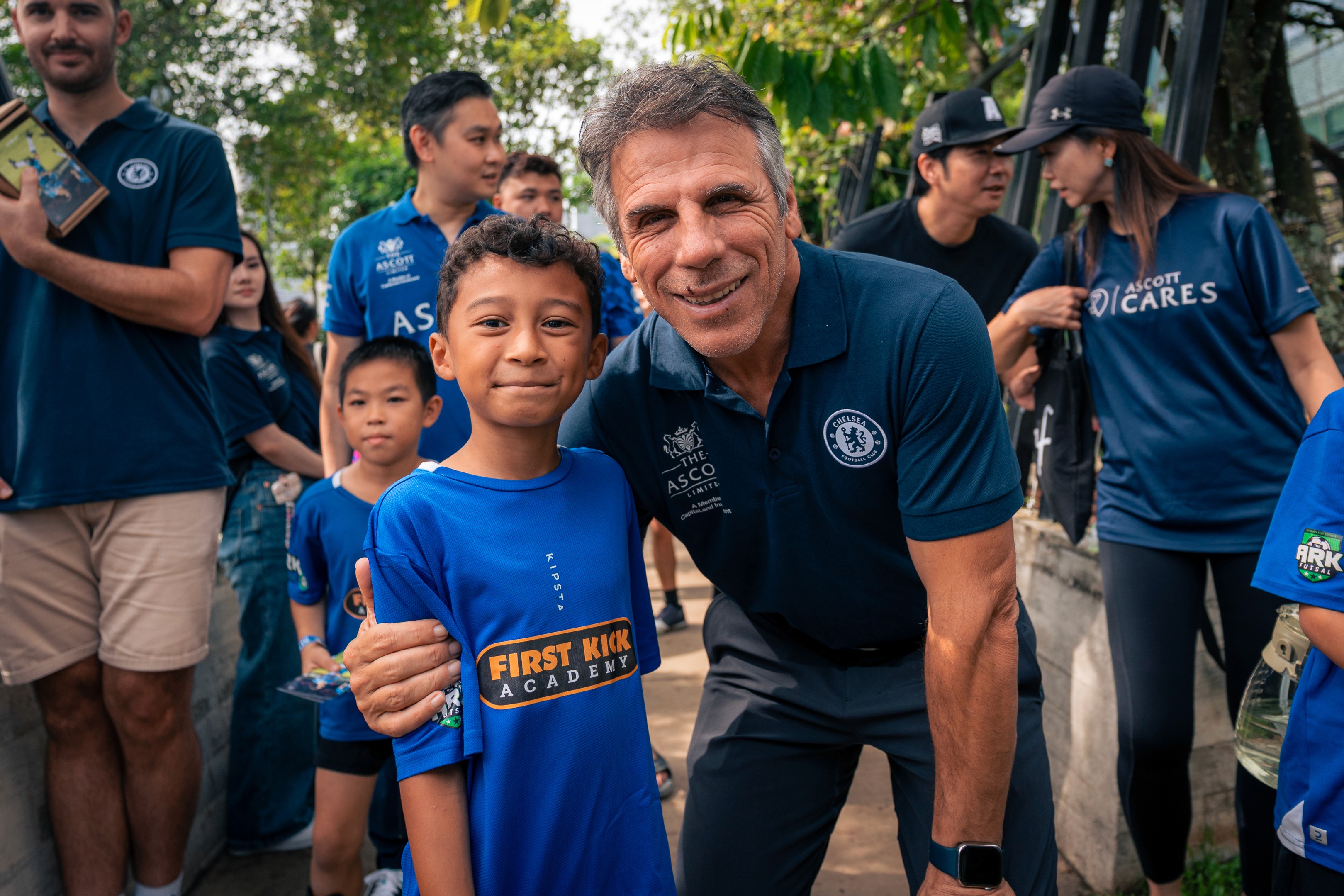 Gianfranco Zola posing for a photo with a Chelsea fan during The Famous CFC in Singapore, 2024