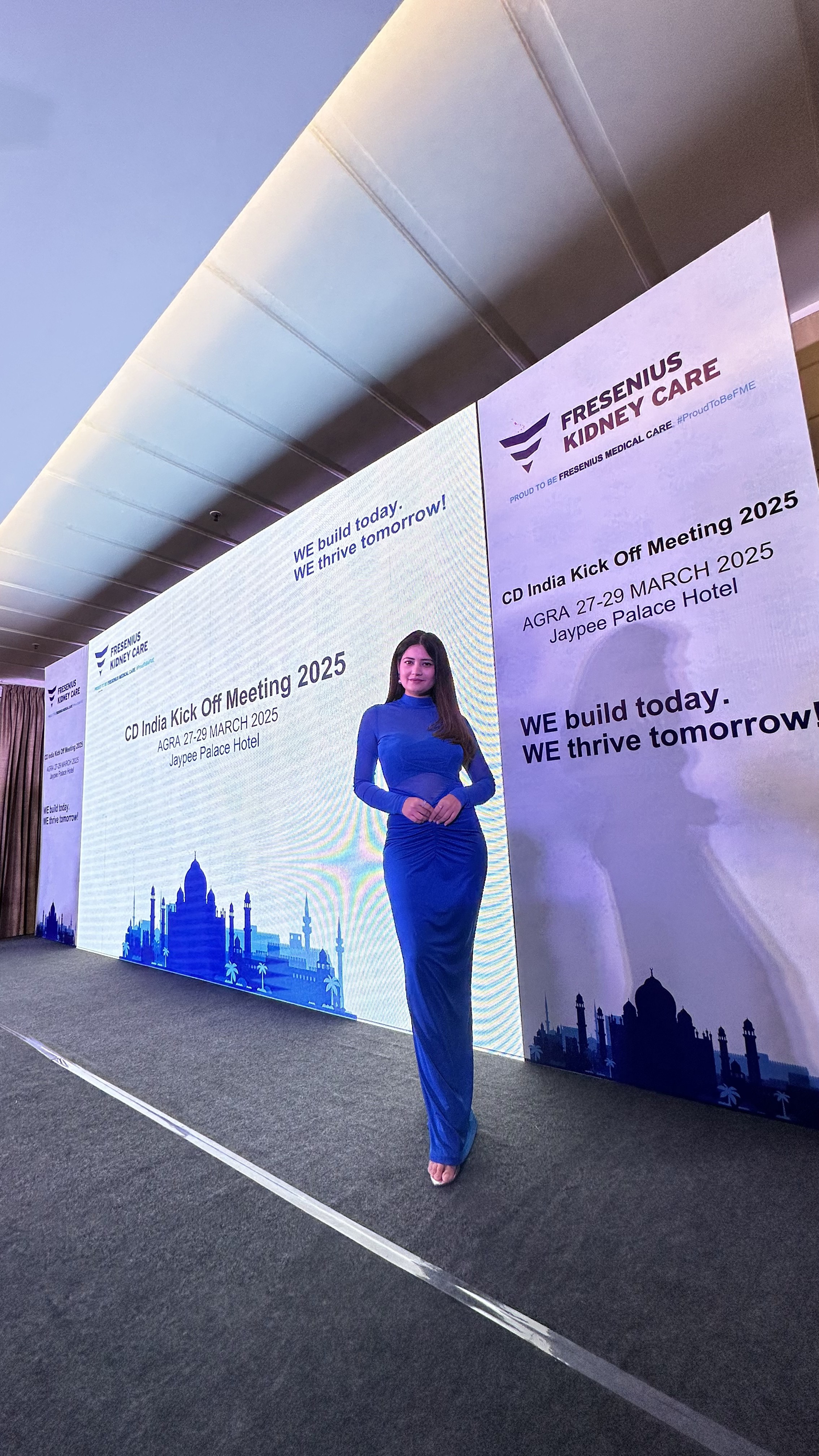 Almas Khan anchoring a corporate conference on stage