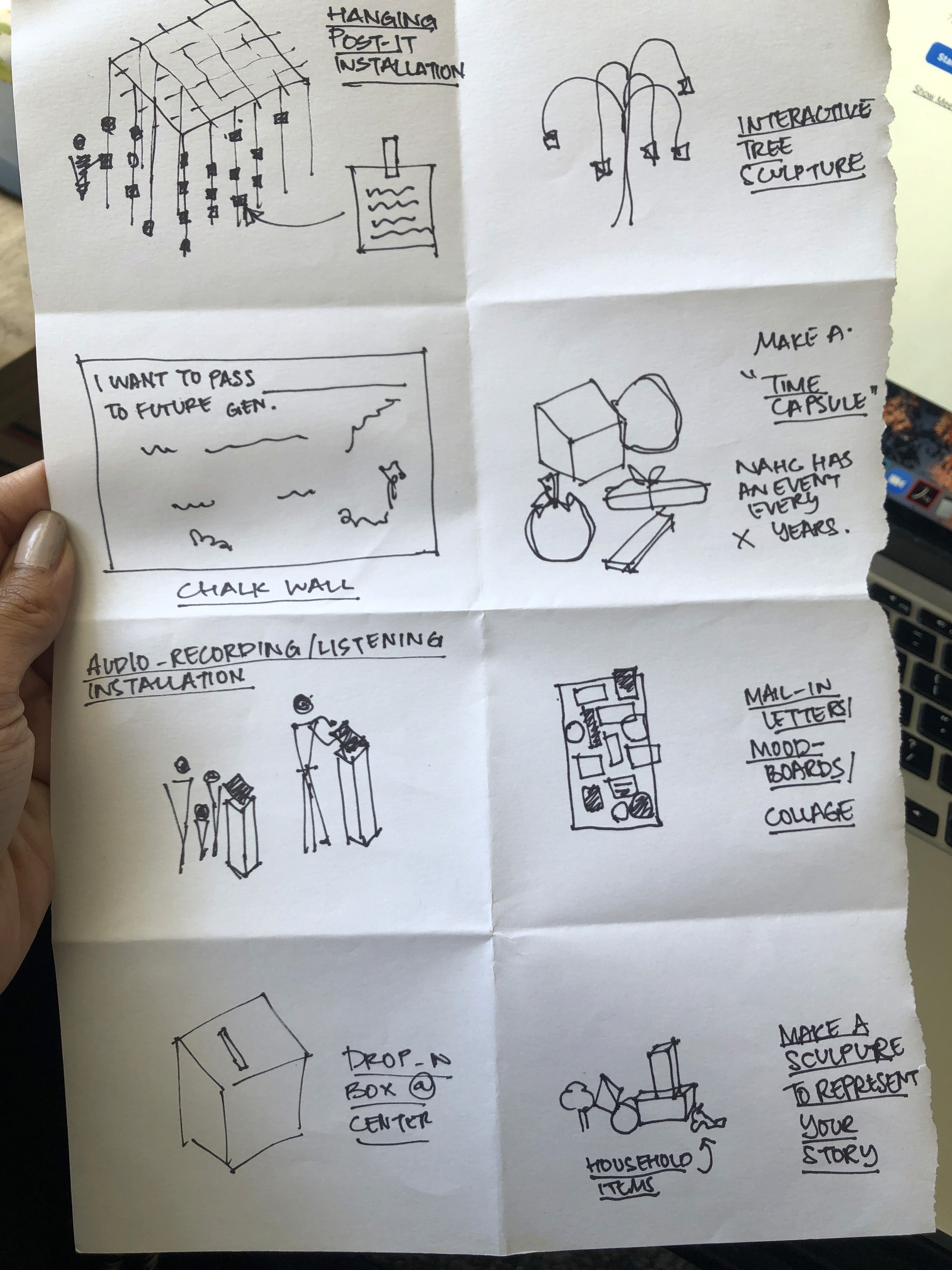 Modern home office setup with a monitor, ergonomic chair, keyboard, and indoor plants near a window with blinds.