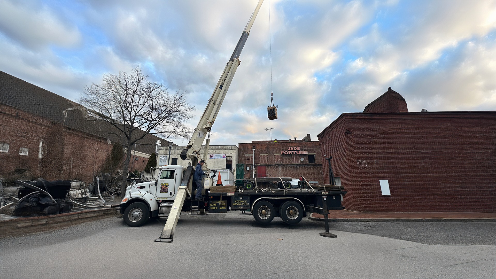 technicians fixing hvac unit outdoors