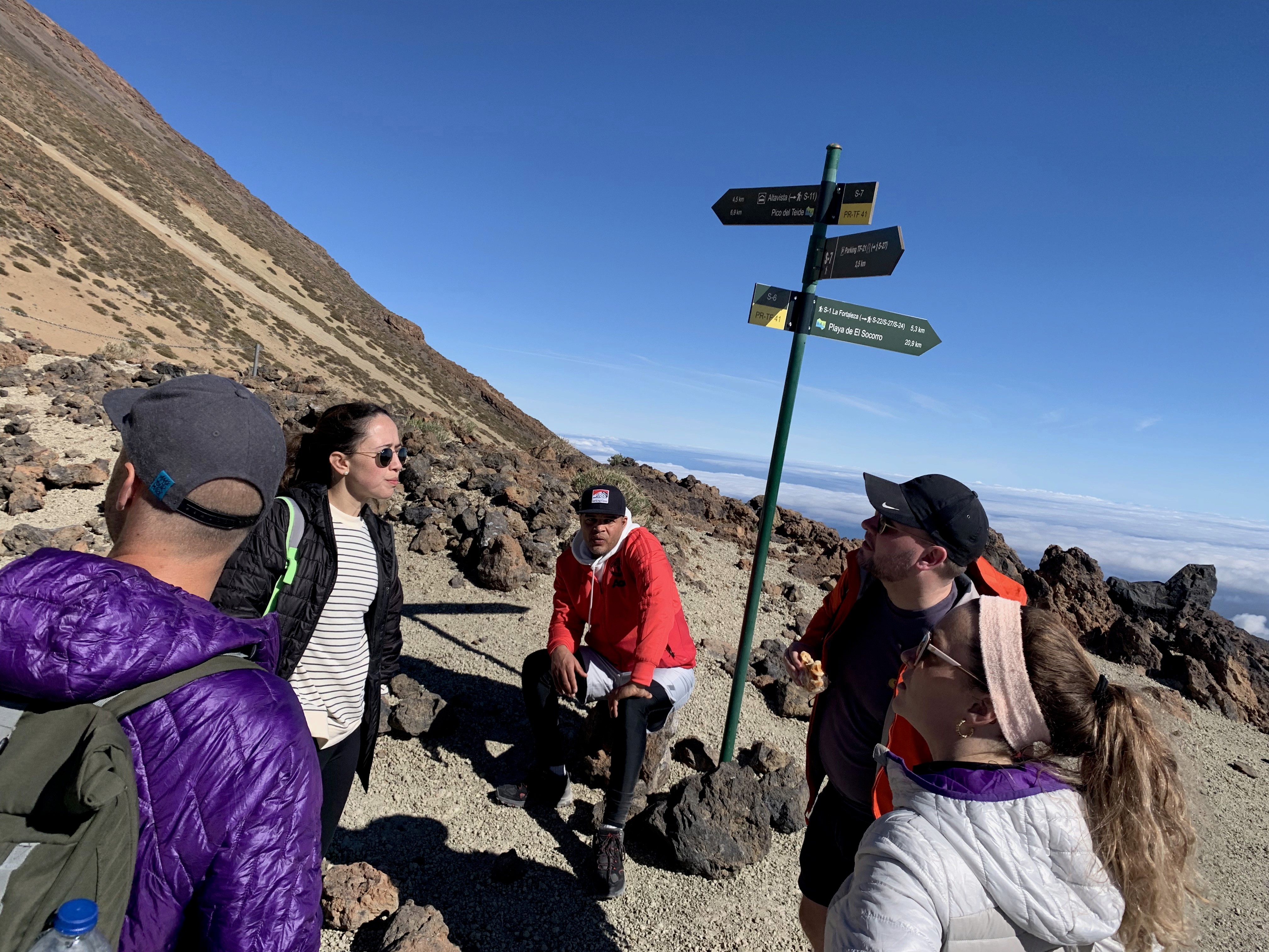 Team waiting on a mountain