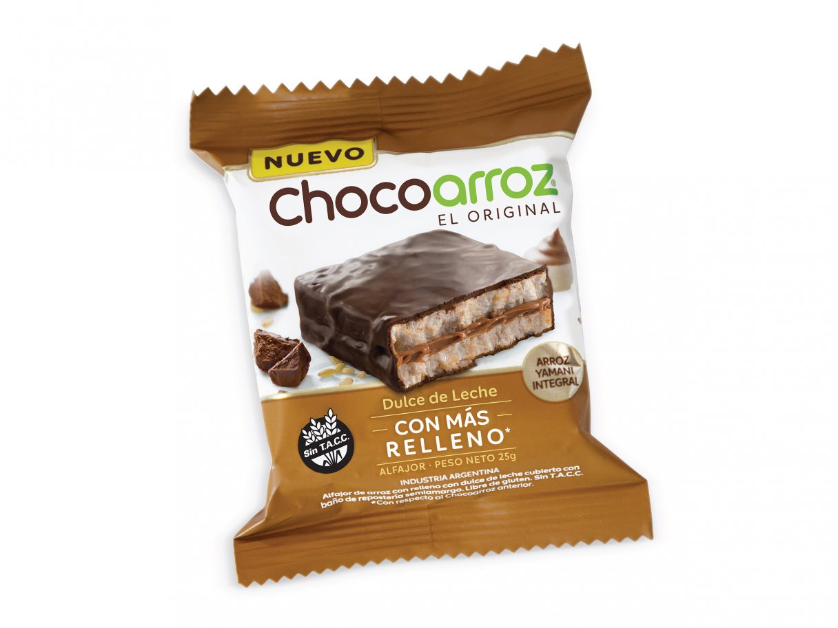 Rustic cabin in a golden field at sunset