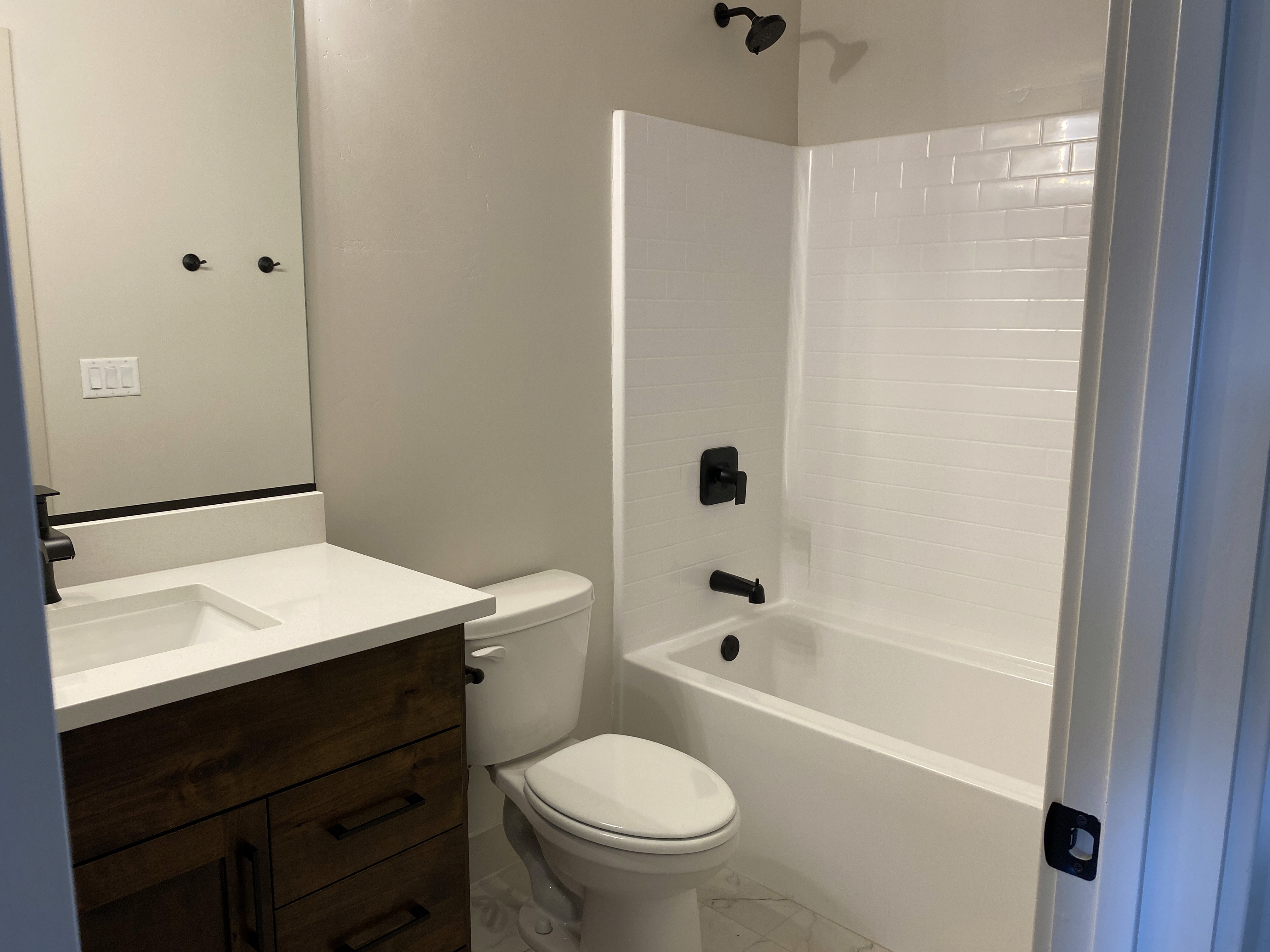 Bathroom in a Southern Utah duplex with clean finishes and functional layout.