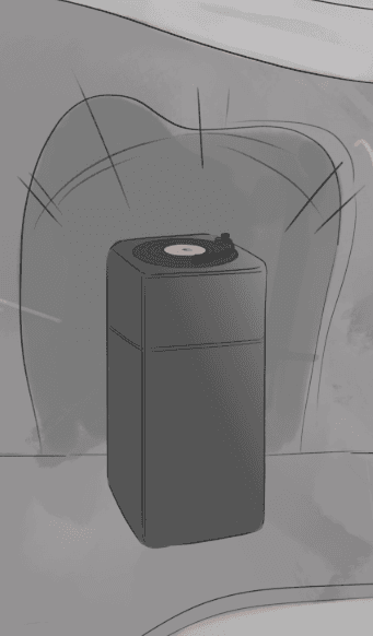 A vinyl record being sliced and falling onto a turntable