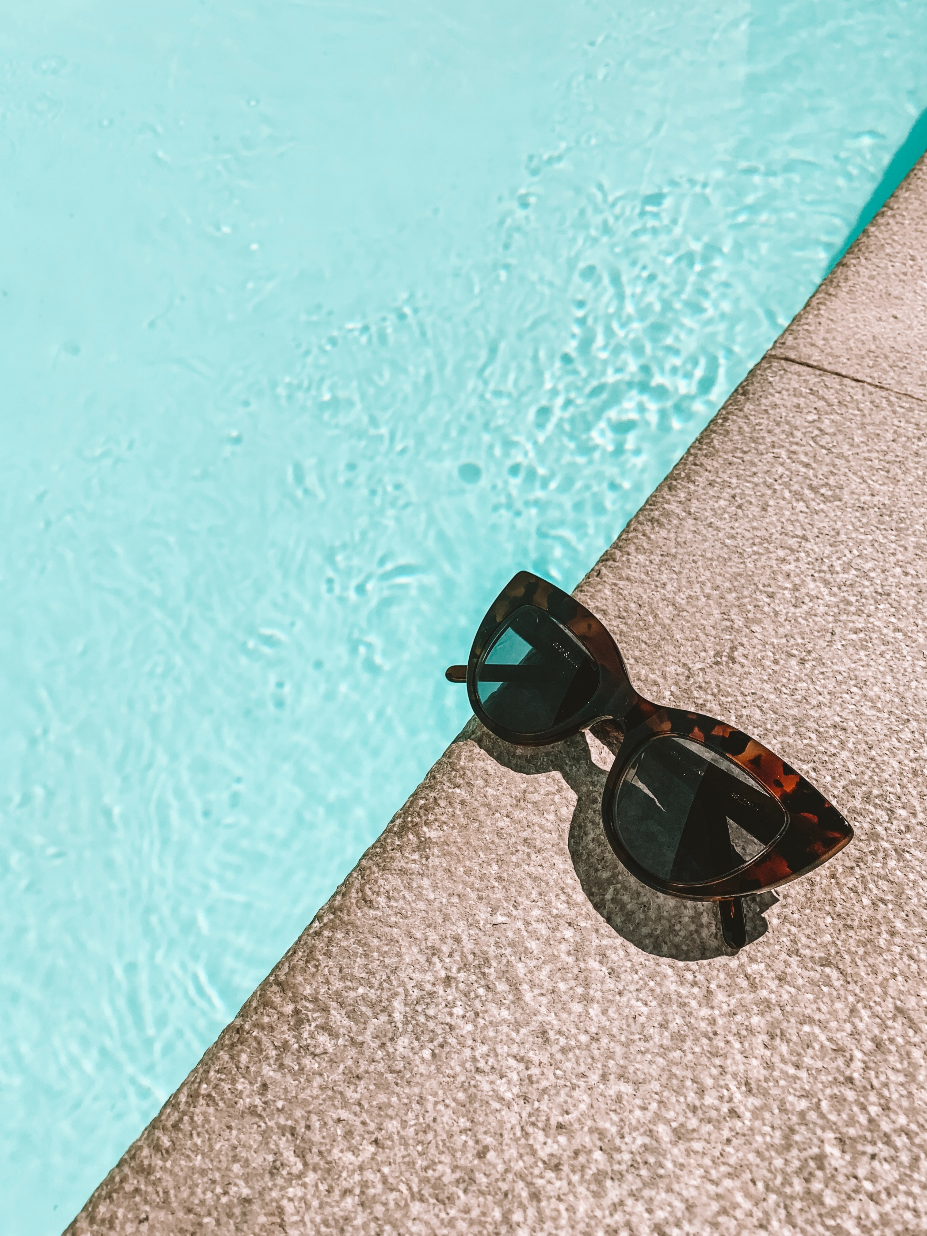 Sunglasses by the pool