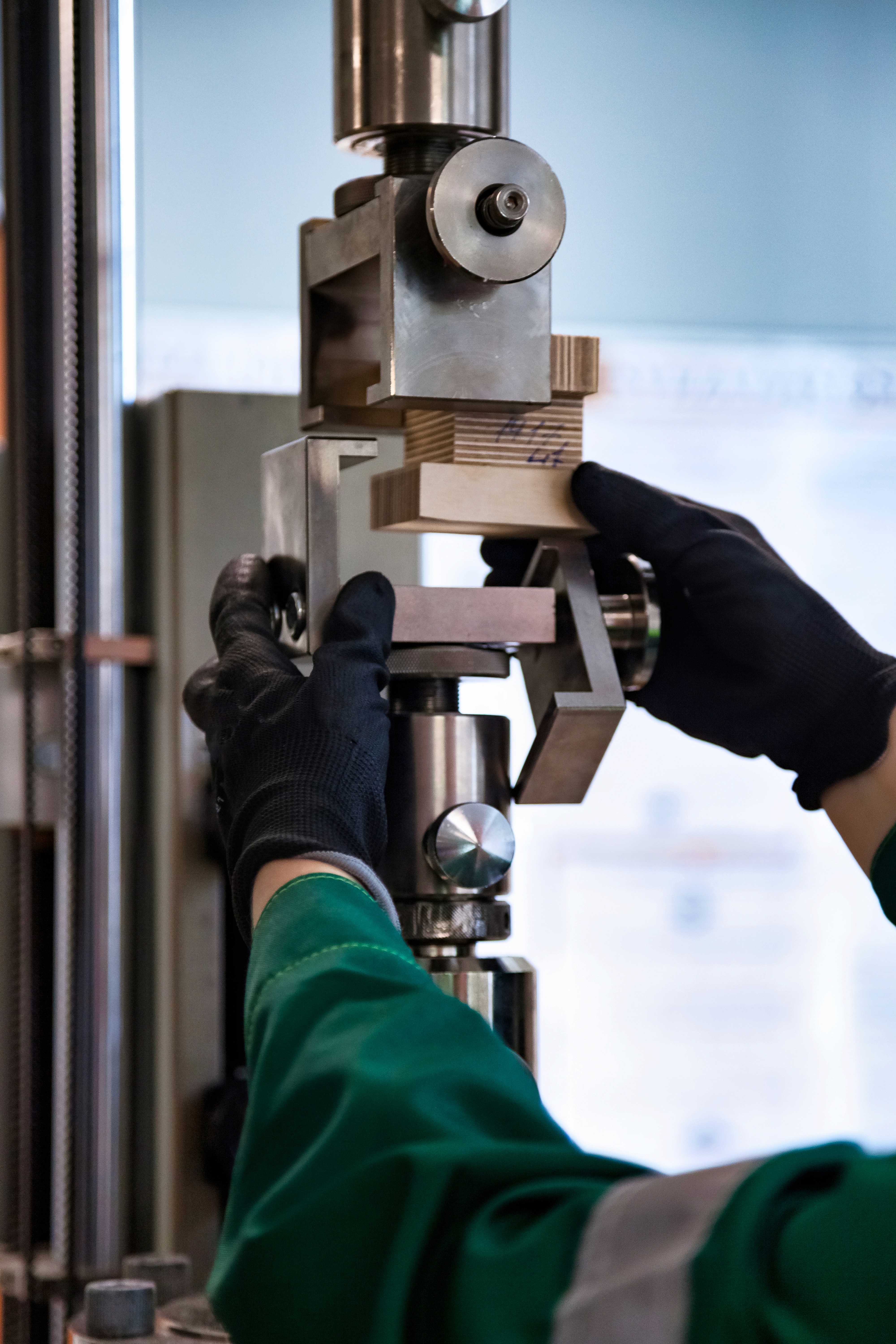 Distribution center surrounded by empty parking spaces and autumn trees